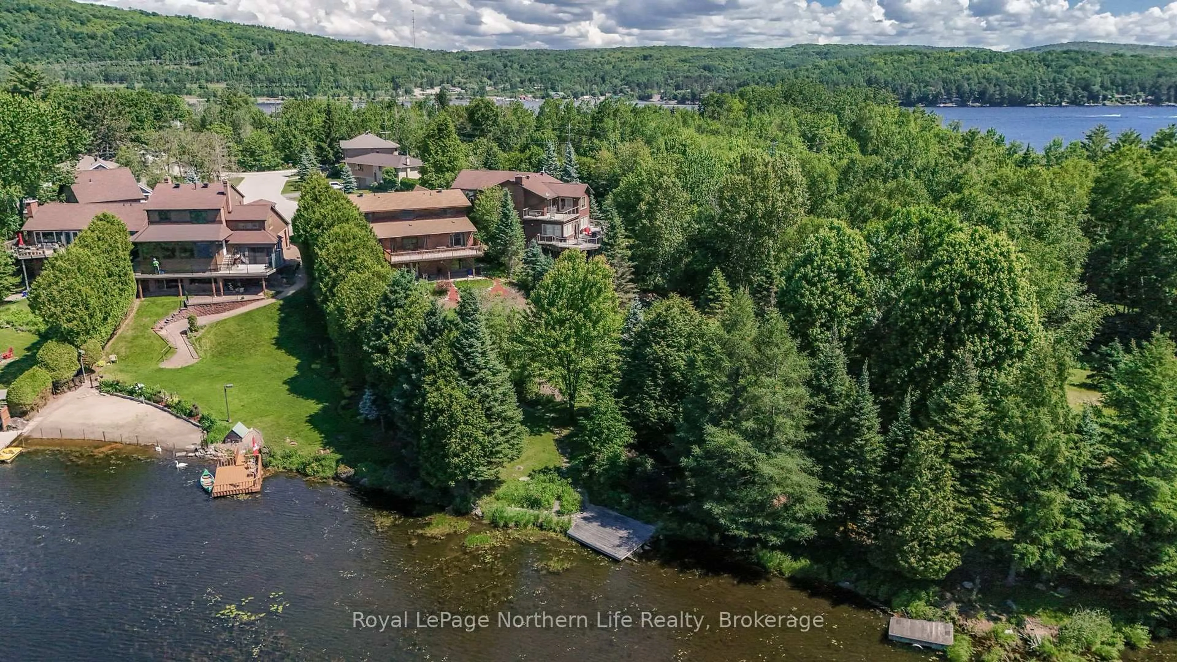 A pic from outside/outdoor area/front of a property/back of a property/a pic from drone, water/lake/river/ocean view for 8 Found Crt, North Bay Ontario P1A 4E5