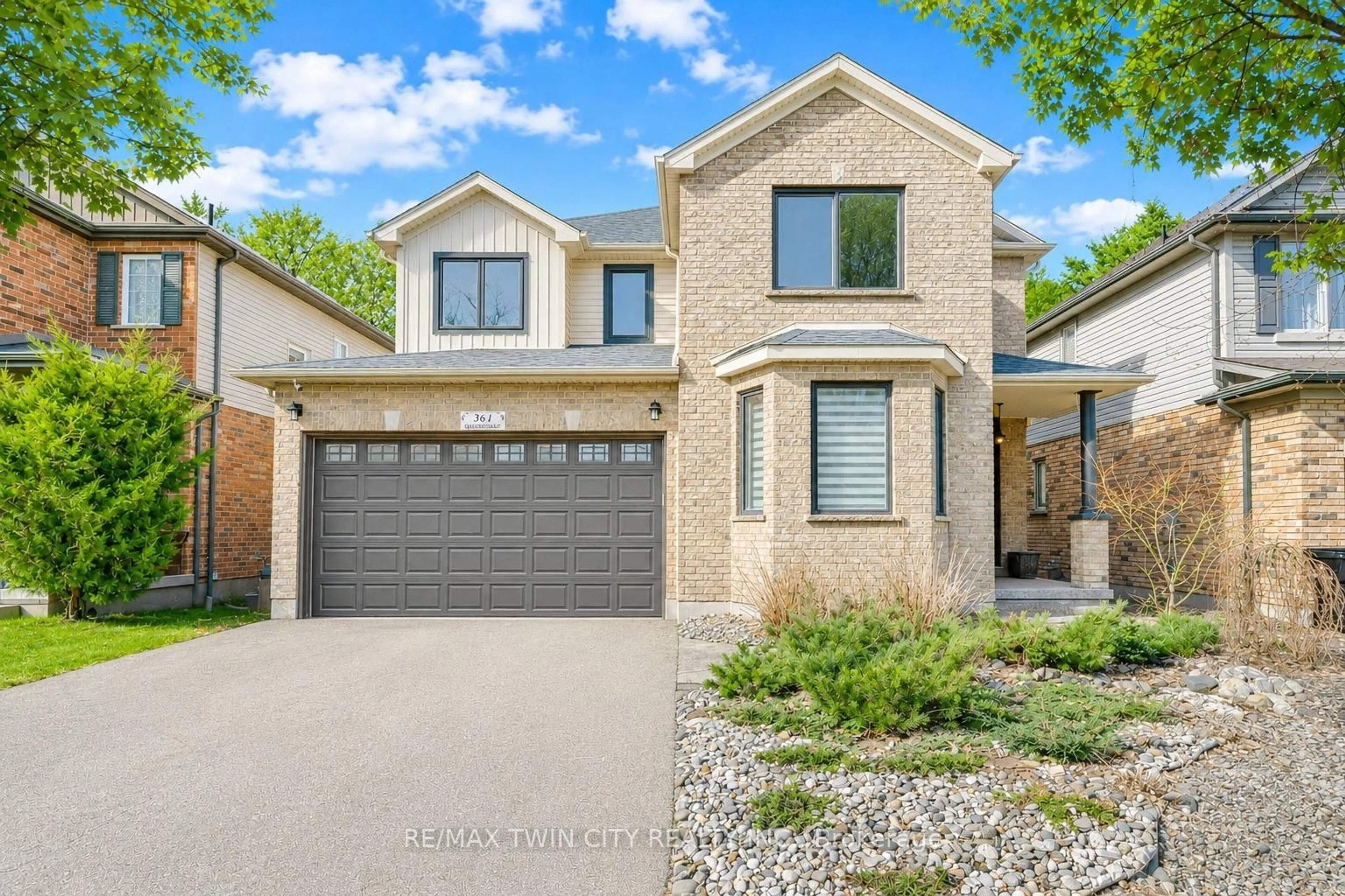 Home with brick exterior material, street for 361 Red Osier Rd, Waterloo Ontario N2V 2V8