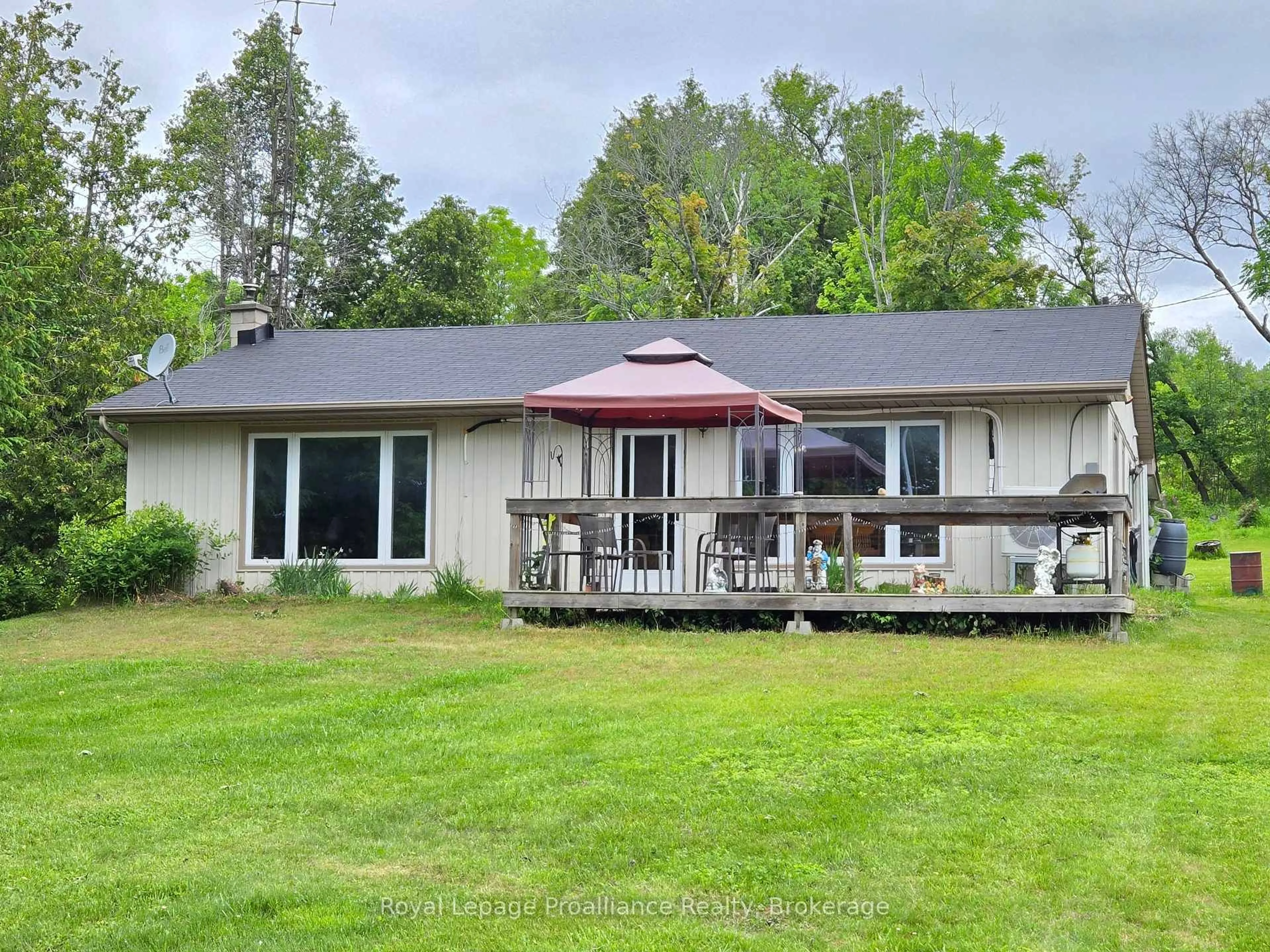 A pic from outside/outdoor area/front of a property/back of a property/a pic from drone, water/lake/river/ocean view for 14368 County Road 2, Cramahe Ontario K0K 1H0