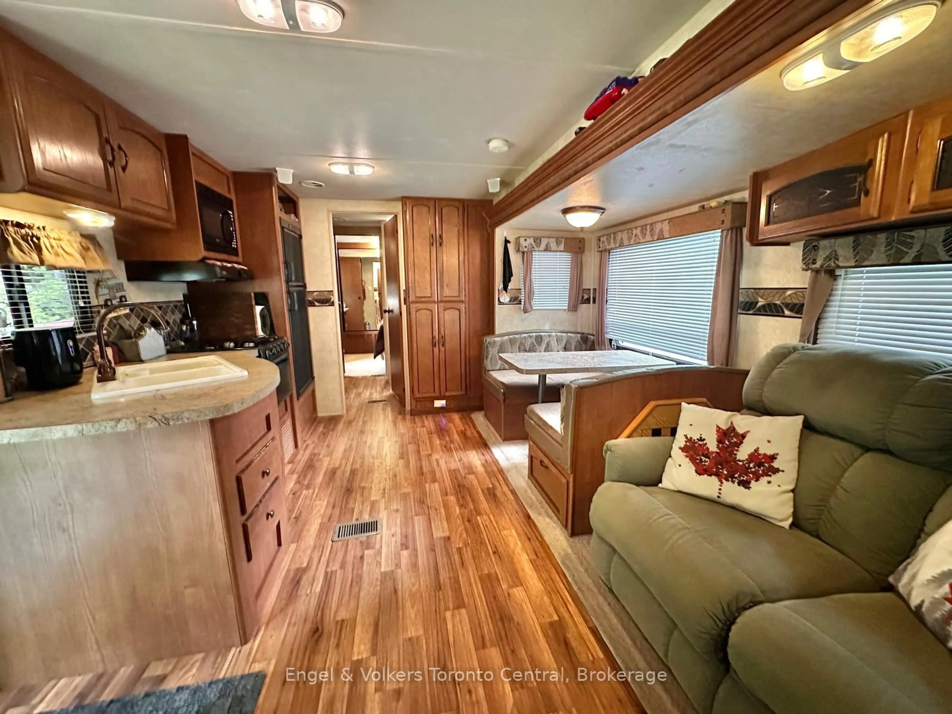 Open concept kitchen, wood/laminate floor for 7489 SIDEROAD 5 E #W 22, Wellington North Ontario N0G 2L0