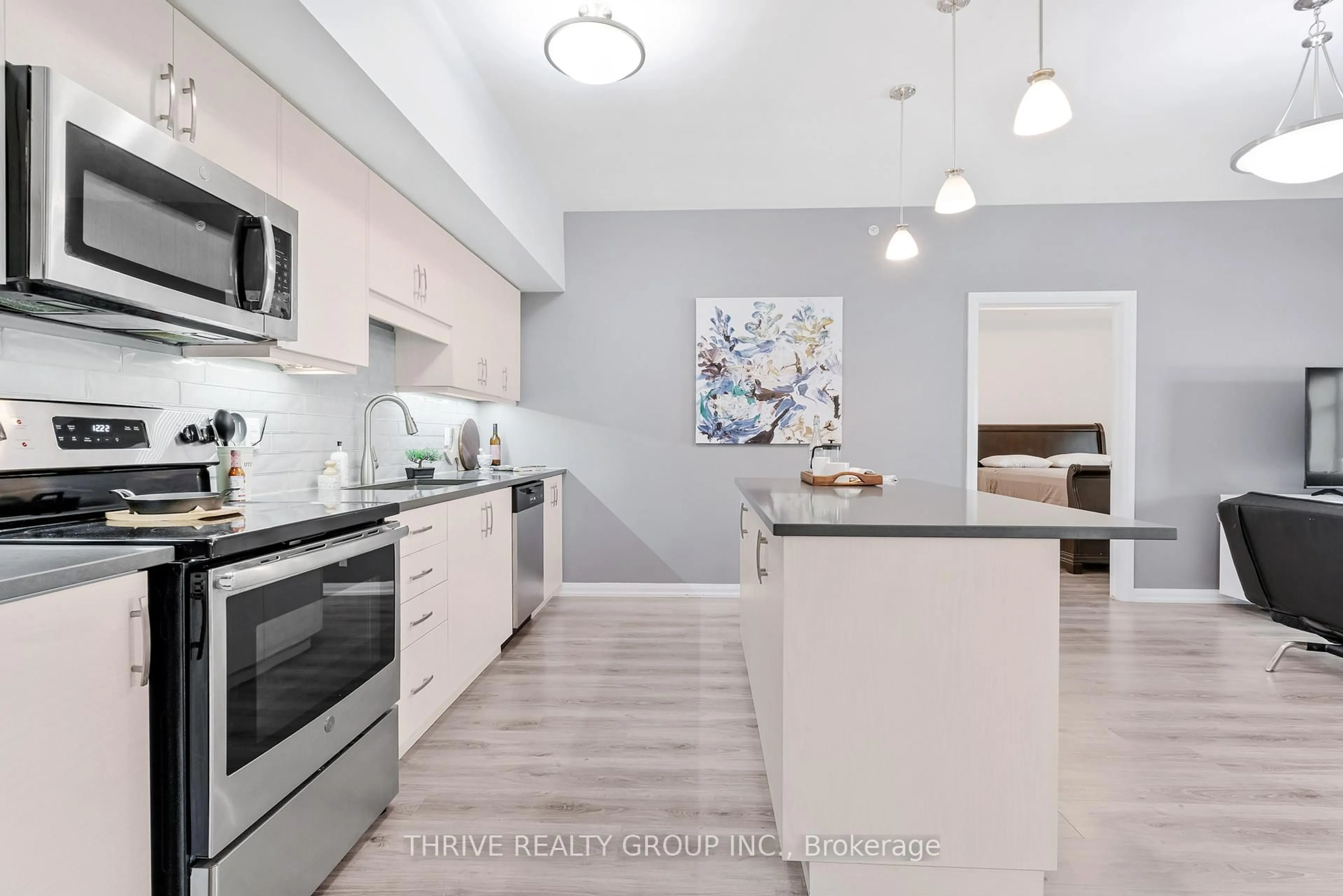 Open concept kitchen, ceramic/tile floor for 778 Laurelwood Dr #206, Waterloo Ontario N2V 0G3