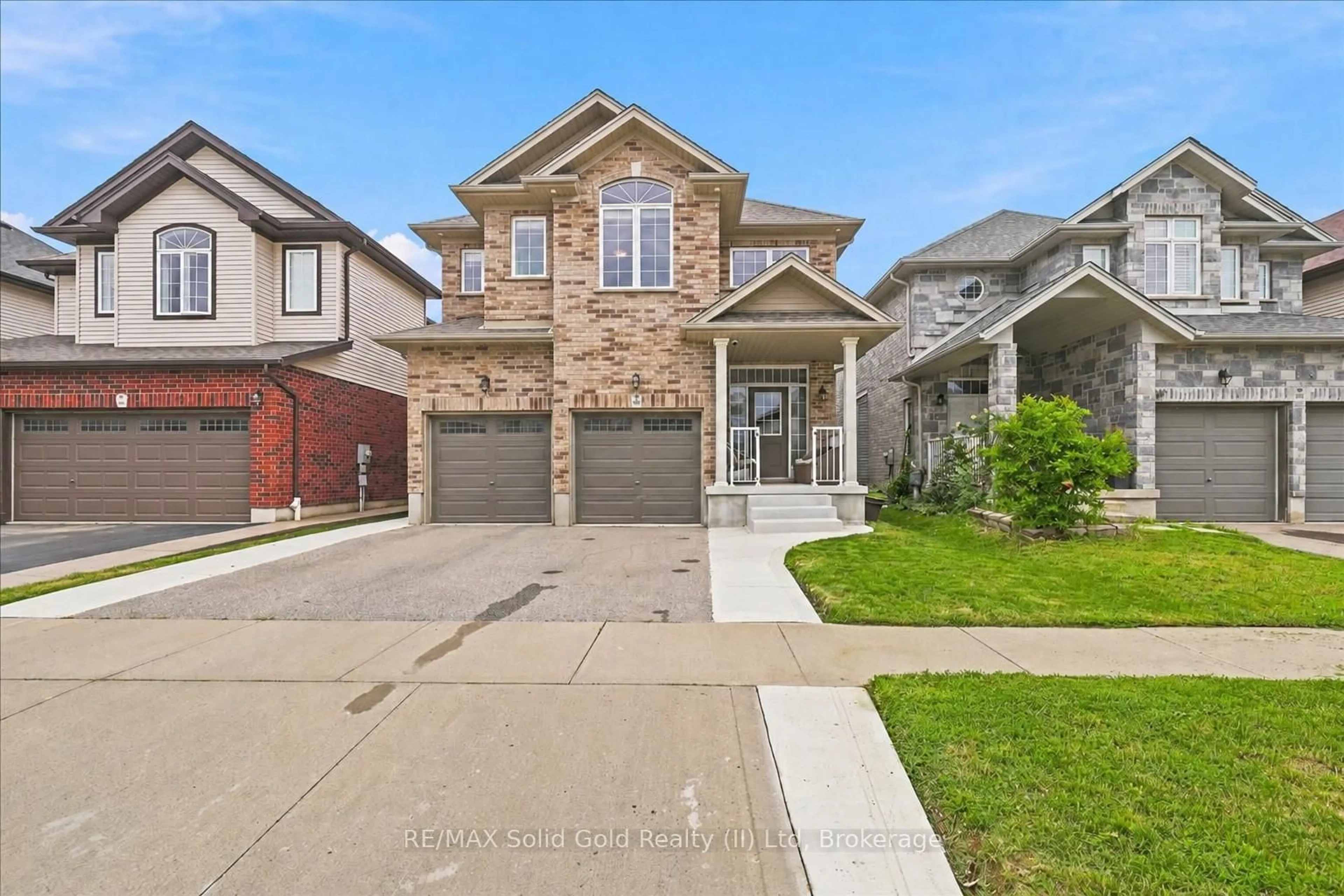 Home with brick exterior material, street for 921 Eden Oak Crt, Kitchener Ontario N2A 0H4
