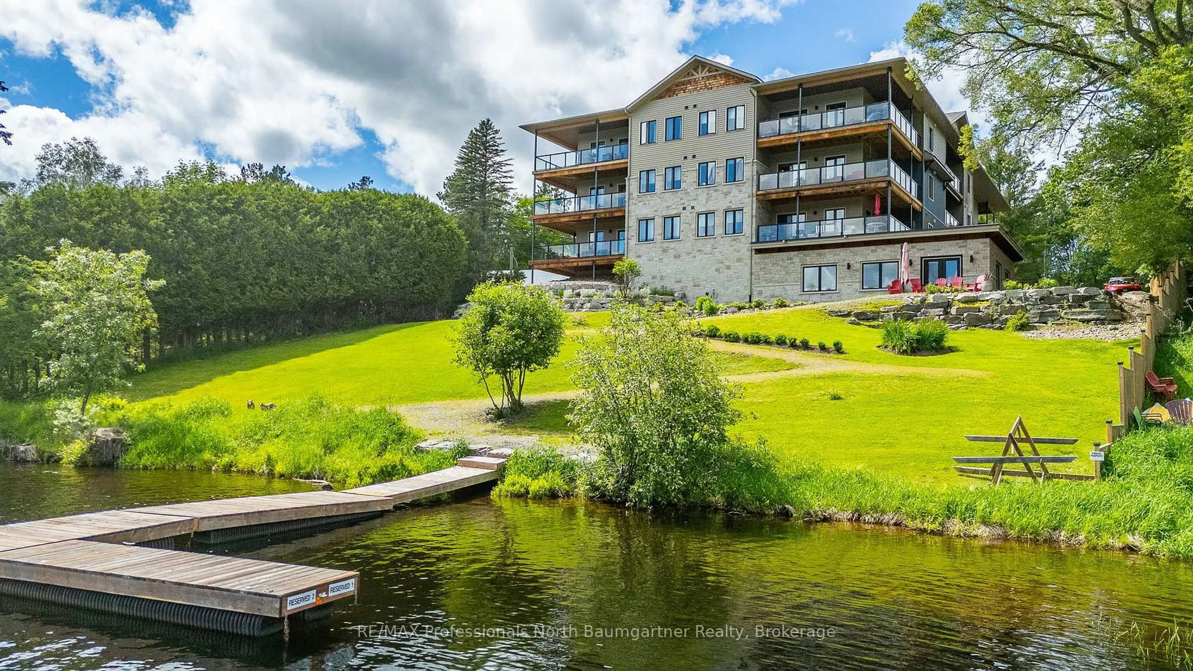 A pic from outside/outdoor area/front of a property/back of a property/a pic from drone, water/lake/river/ocean view for 75 Wallings Rd #303, Dysart et al Ontario K0M 1S0