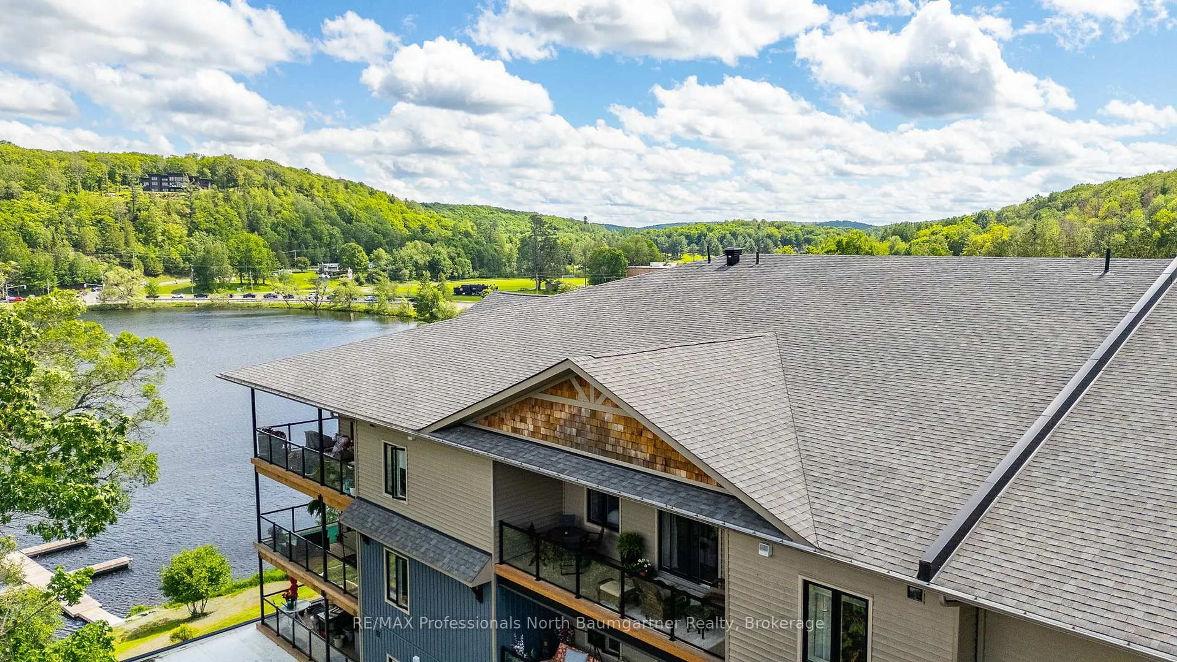 A pic from outside/outdoor area/front of a property/back of a property/a pic from drone, water/lake/river/ocean view for 75 Wallings Rd #303, Dysart et al Ontario K0M 1S0
