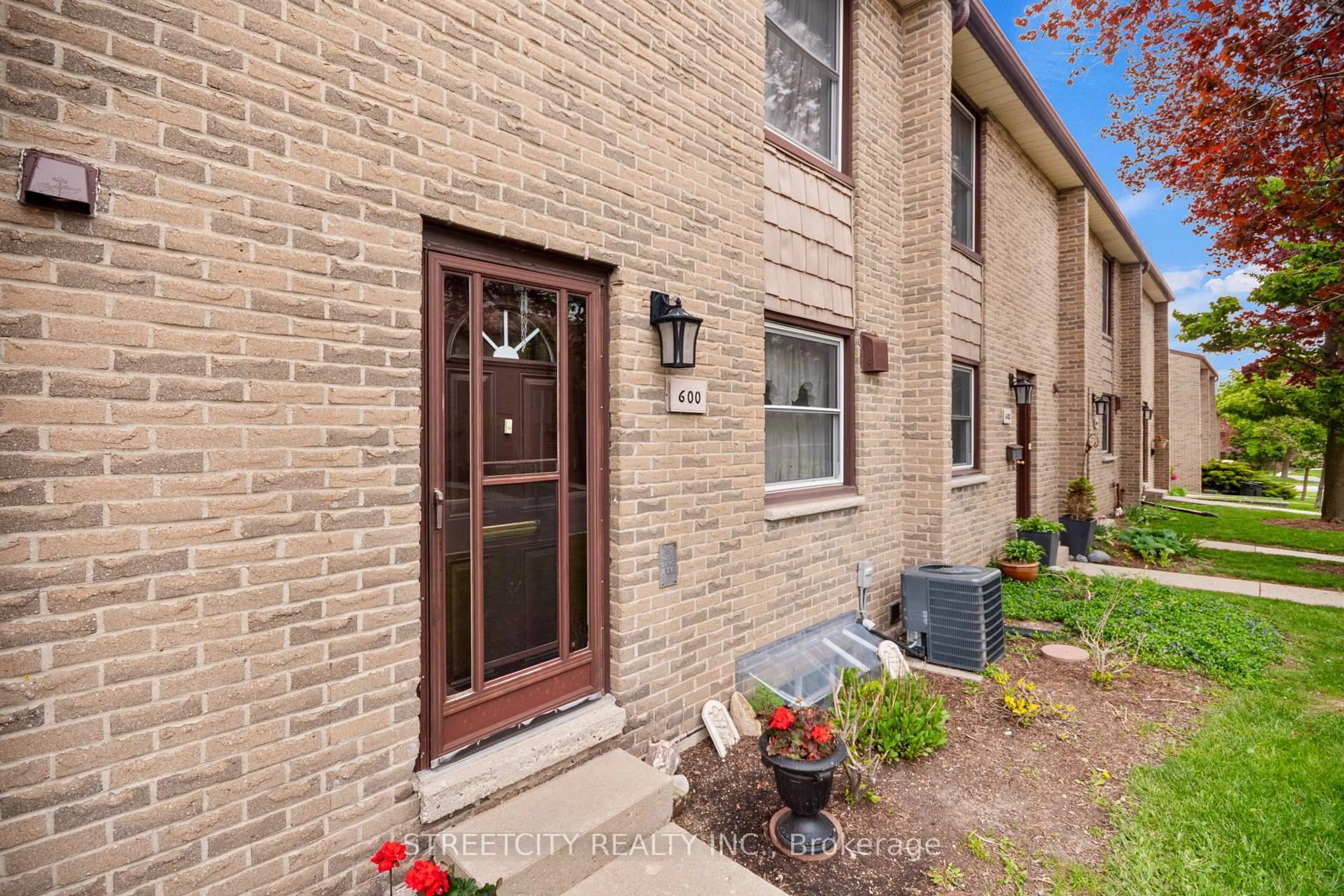 Home with brick exterior material, street for 600 Wonderland Rd, London South Ontario N6H 4Y8