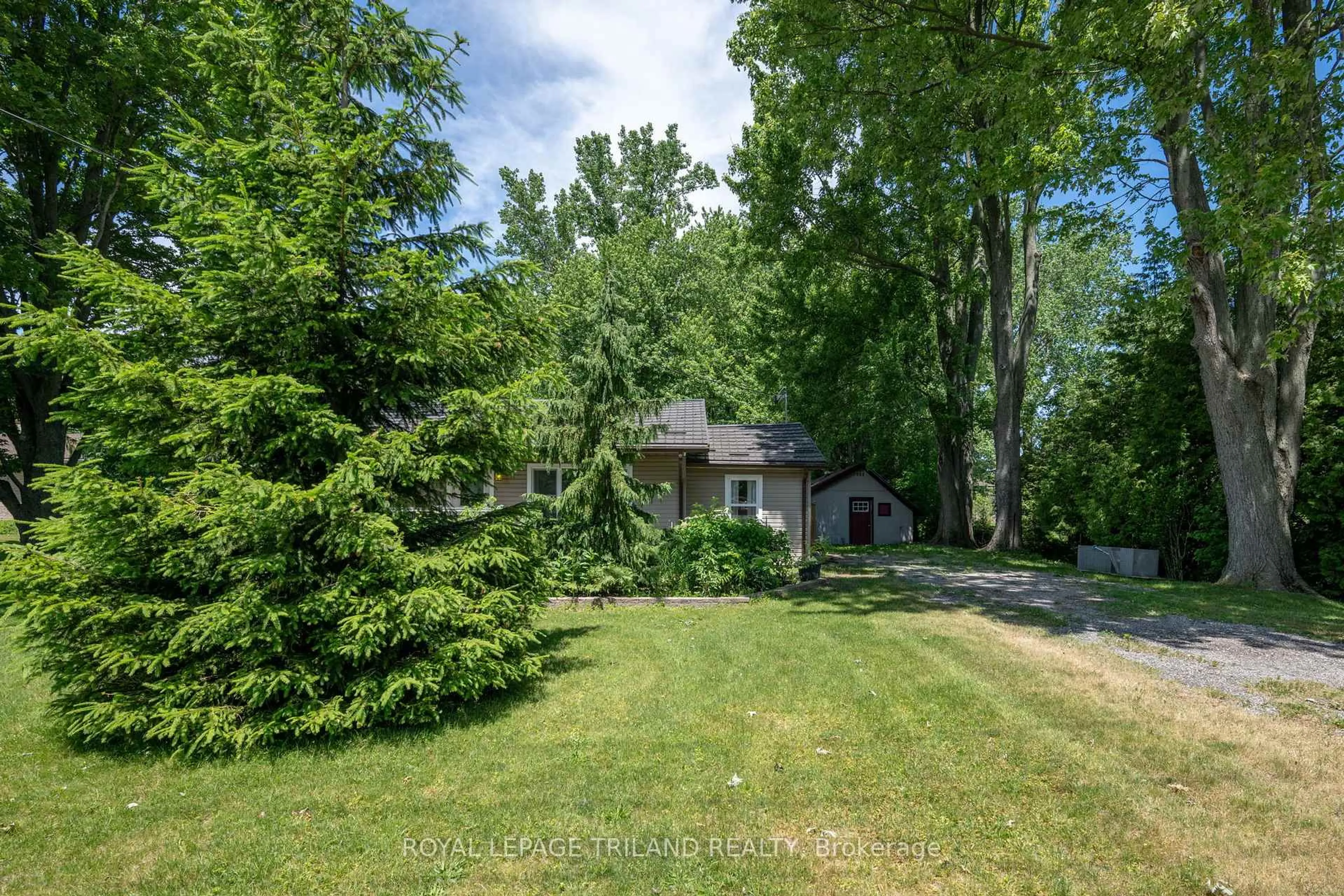 A pic from outside/outdoor area/front of a property/back of a property/a pic from drone, unknown for 22516 Pioneer Line, West Elgin Ontario N0L 2C0