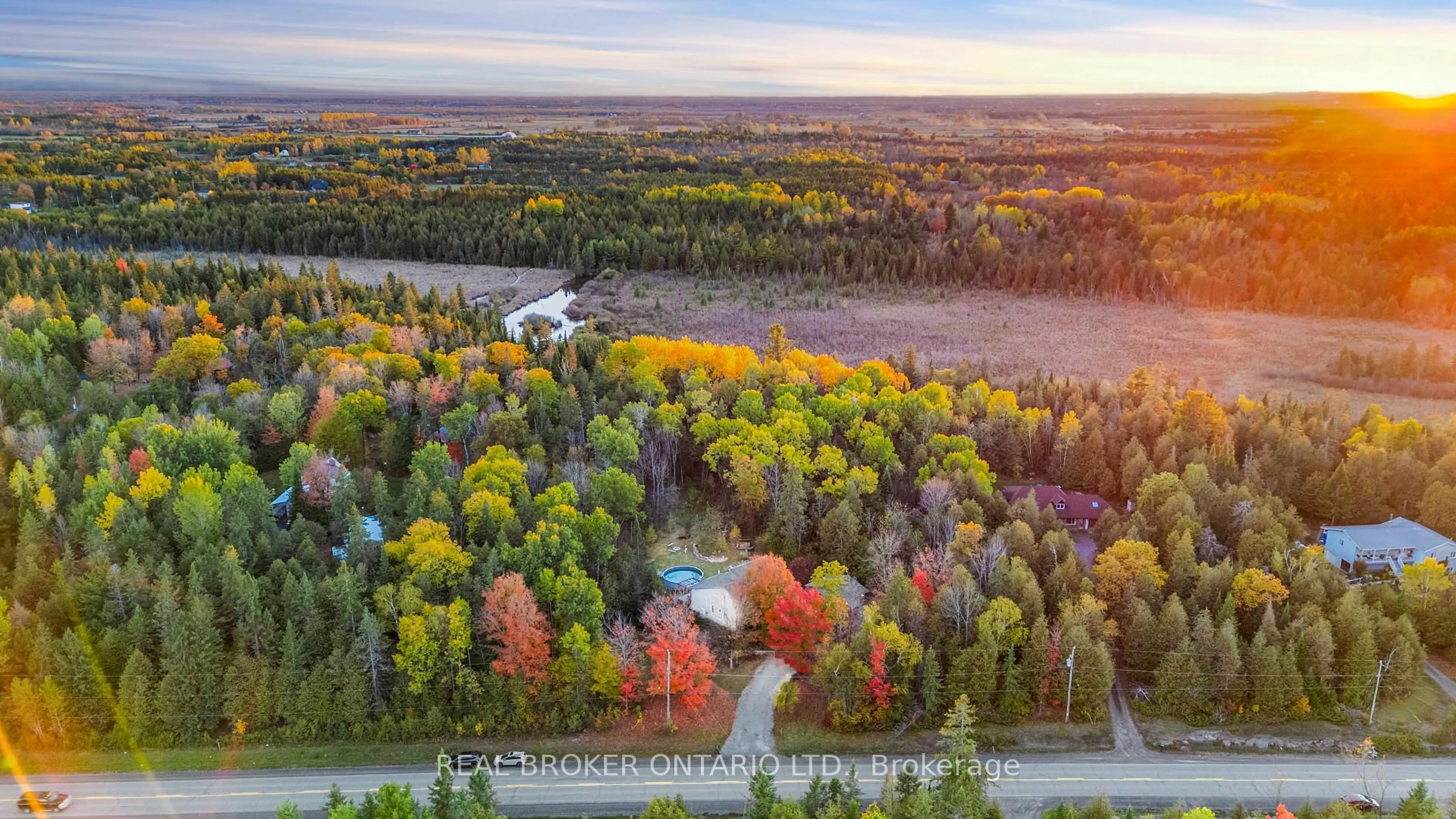 A pic from outside/outdoor area/front of a property/back of a property/a pic from drone, forest/trees view for 967 Upper Dwyer Hill Rd, Carp Ontario K0A 1L0