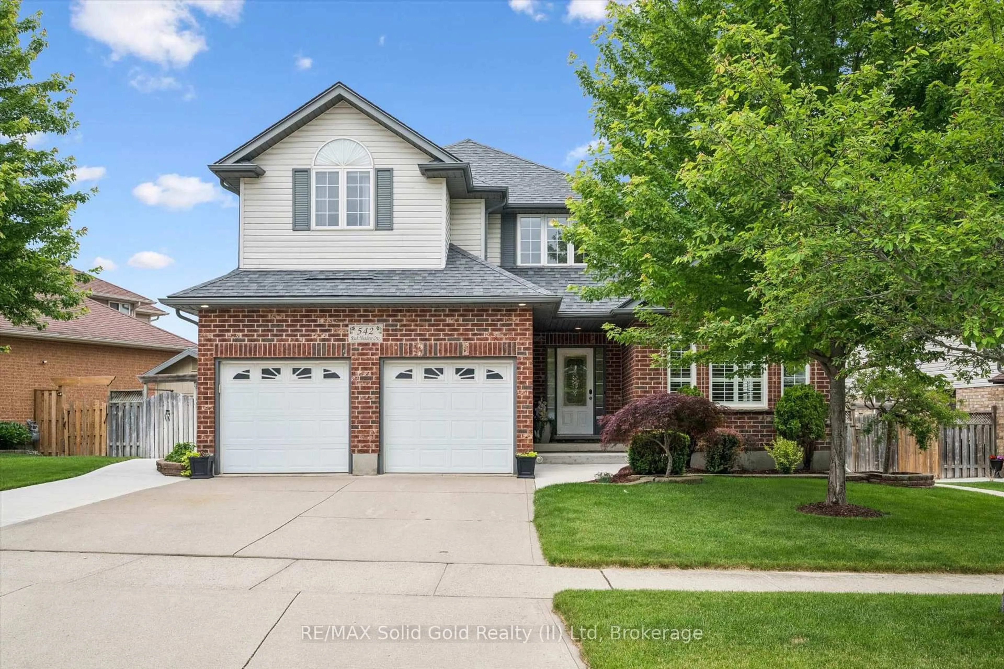 Home with brick exterior material, street for 542 Rush Meadow Cres, Kitchener Ontario N2R 1T1