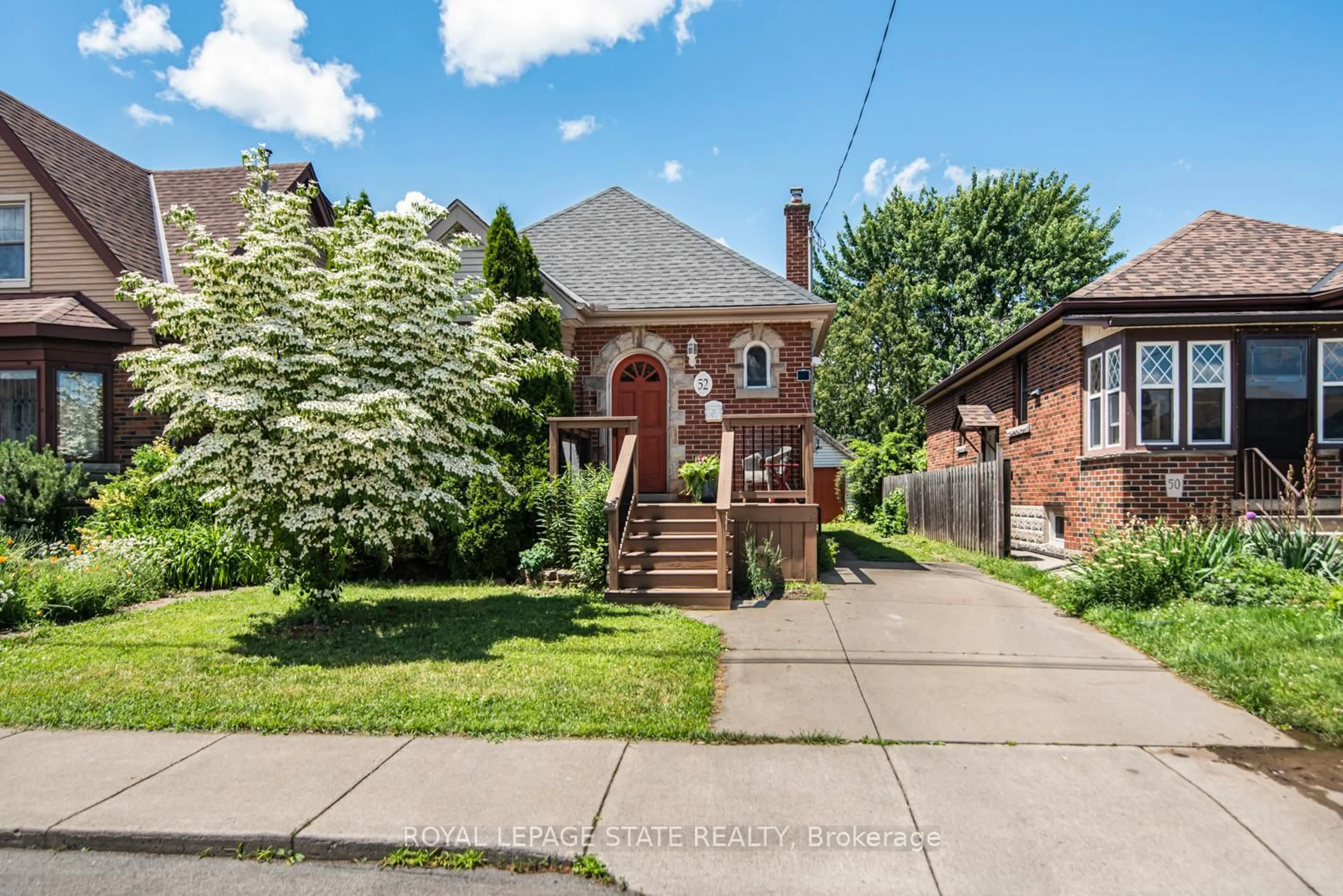 Home with brick exterior material, street for 52 Cameron Ave, Hamilton Ontario L8K 2W9