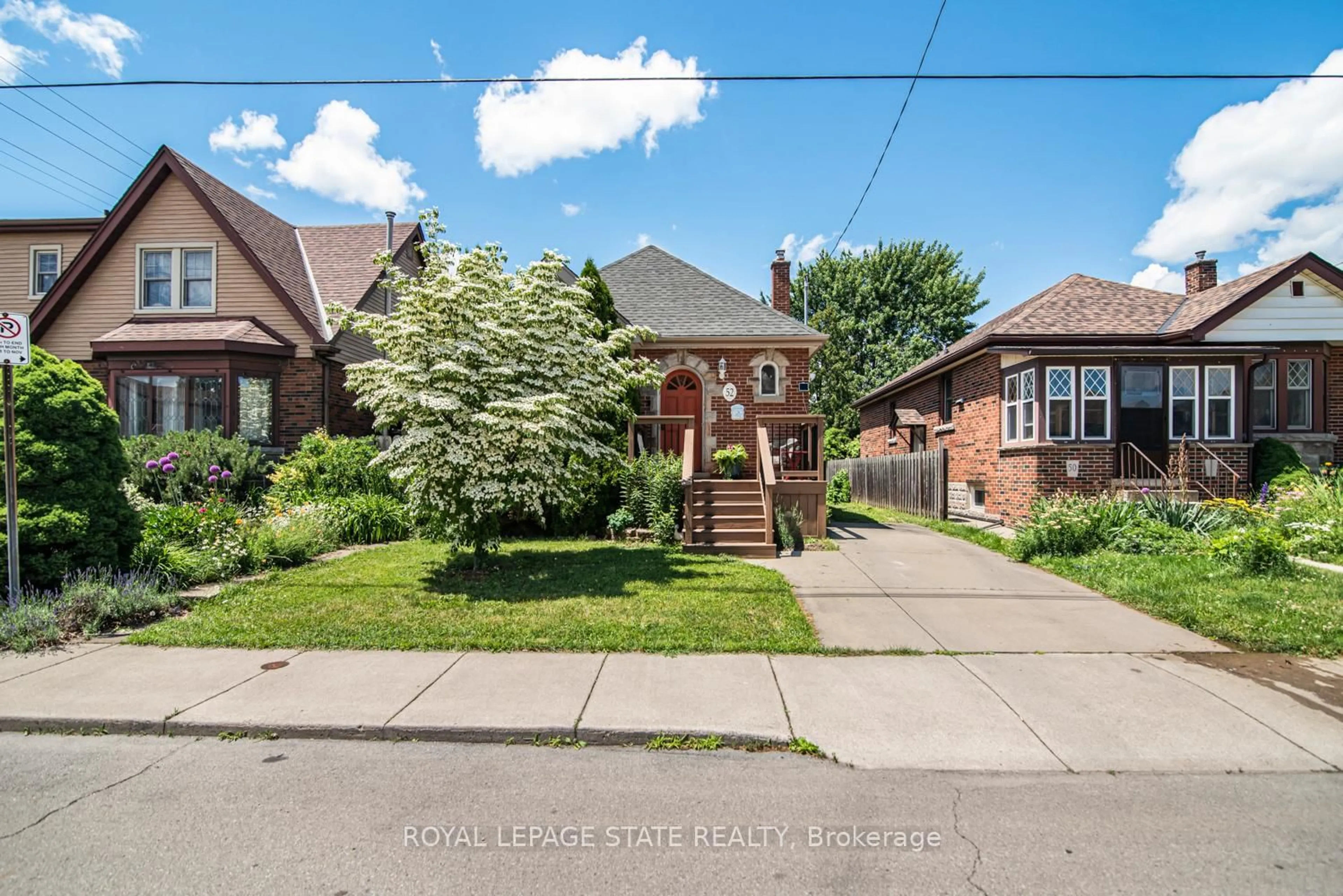 Home with brick exterior material, street for 52 Cameron Ave, Hamilton Ontario L8K 2W9