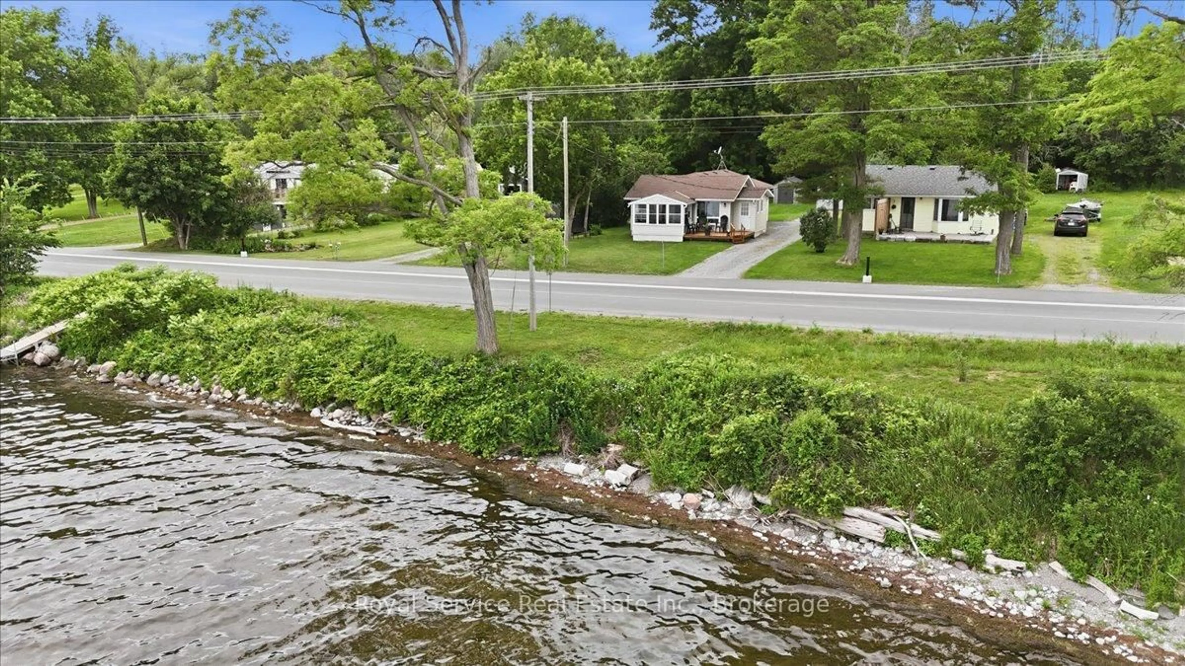 A pic from outside/outdoor area/front of a property/back of a property/a pic from drone, water/lake/river/ocean view for 80 Paudash St, Otonabee-South Monaghan Ontario K9J 0E6