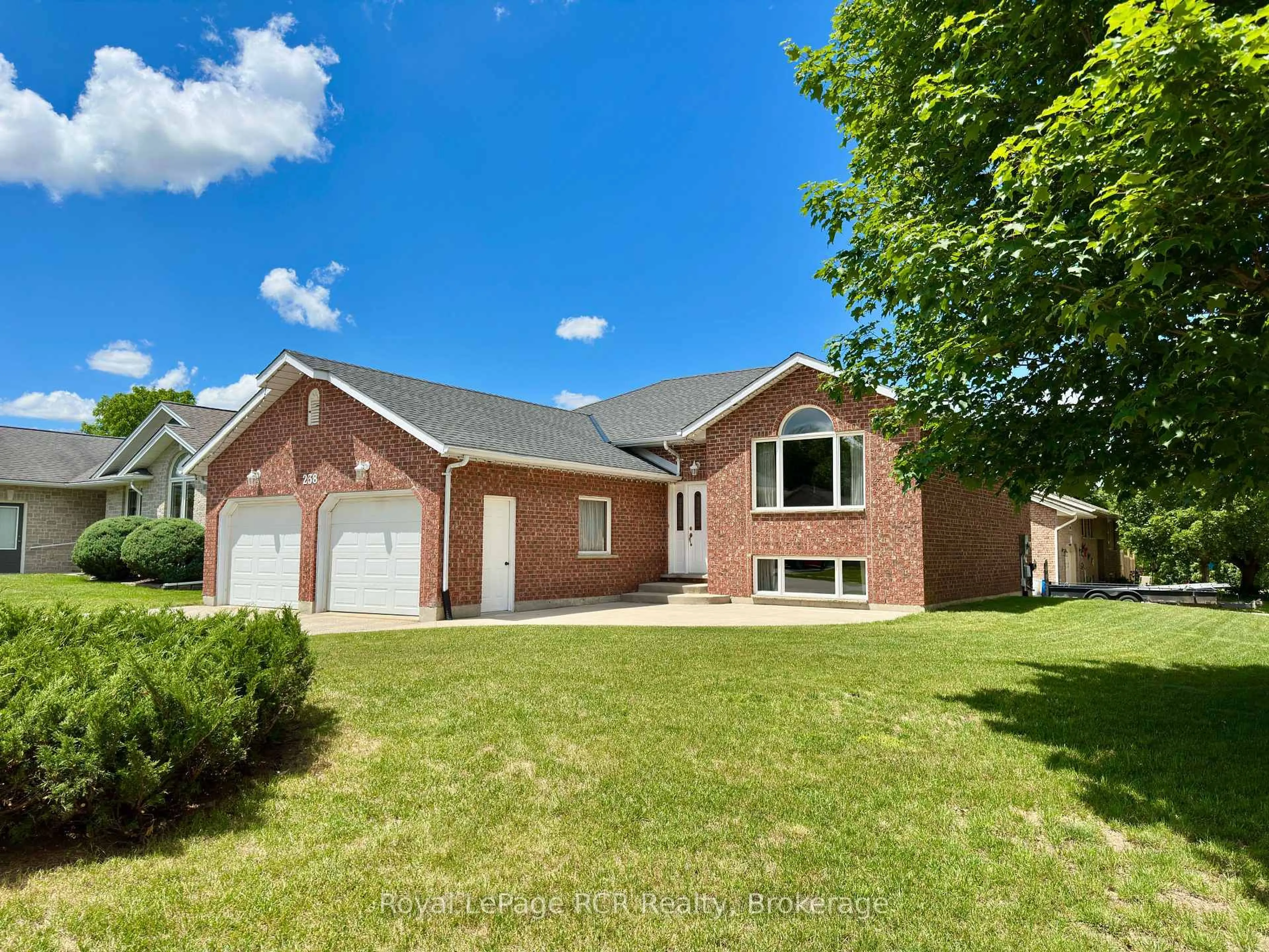 Home with brick exterior material, street for 238 4th Street Cres, Hanover Ontario N4N 3S2