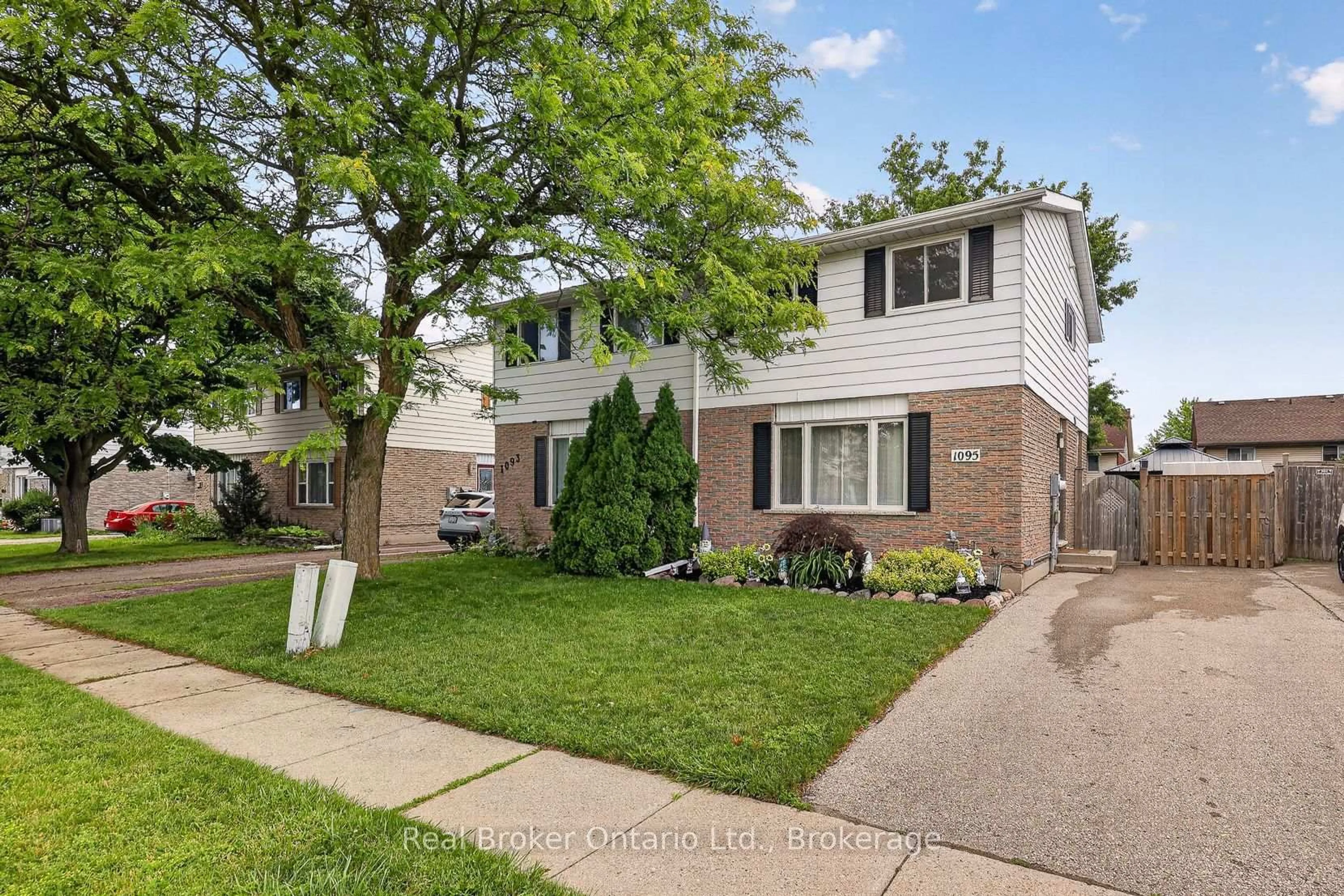 Home with brick exterior material, street for 1095 Canfield Cres, Woodstock Ontario N4S 8P3