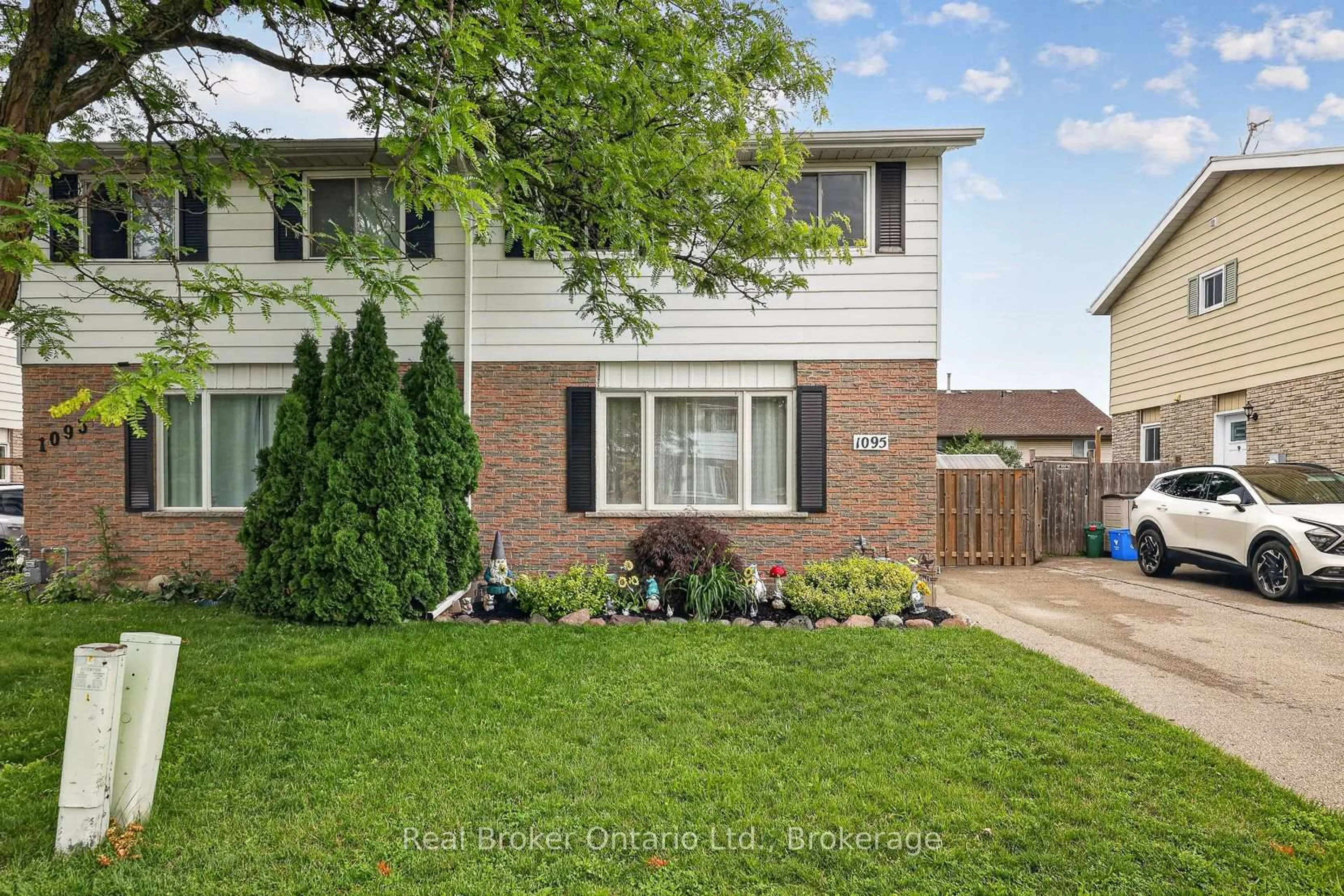 Home with brick exterior material, street for 1095 Canfield Cres, Woodstock Ontario N4S 8P3
