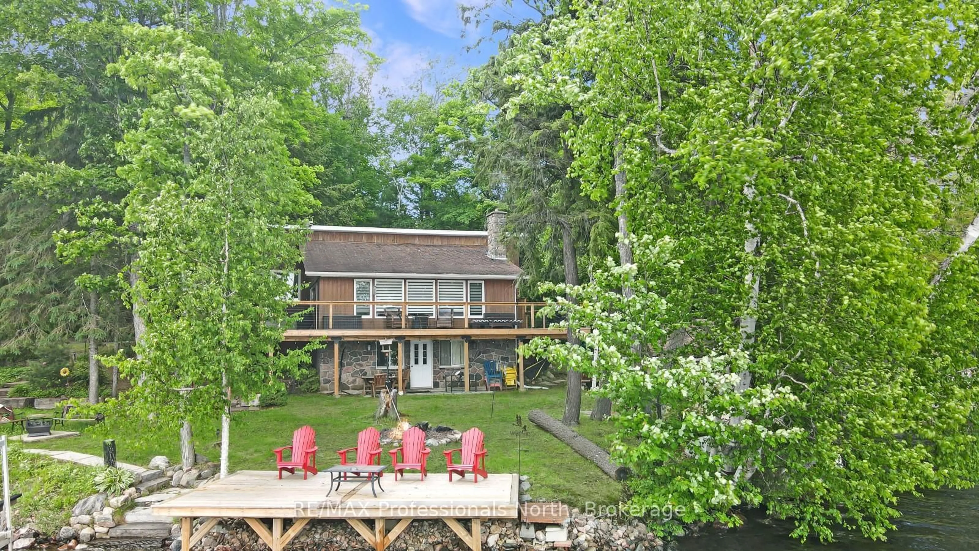 A pic from outside/outdoor area/front of a property/back of a property/a pic from drone, water/lake/river/ocean view for 6198 Haliburton Lake Rd, Dysart et al Ontario K0M 1S0