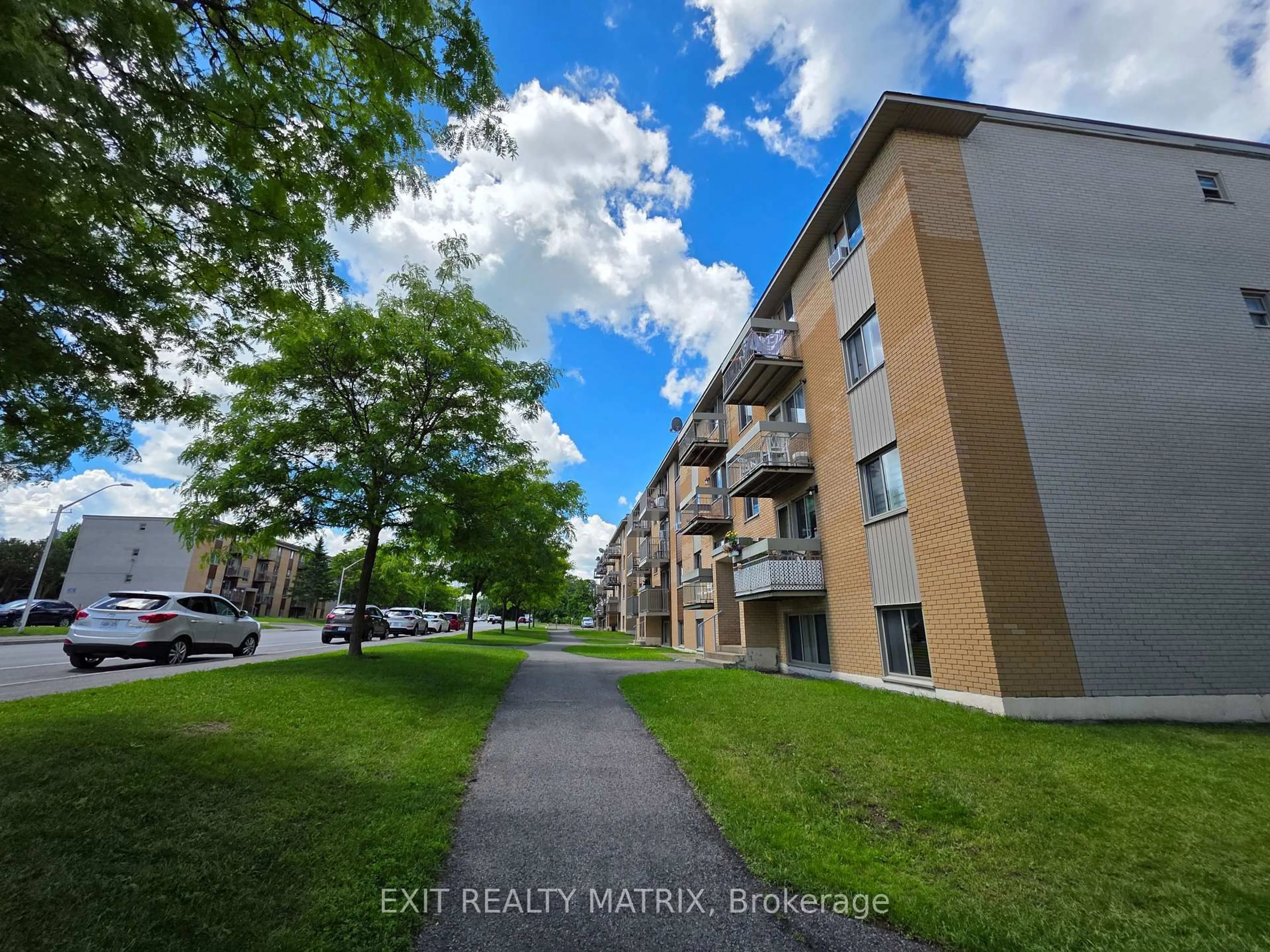 A pic from outside/outdoor area/front of a property/back of a property/a pic from drone, street for 960 Cartier Blvd #8, Hawkesbury Ontario K6A 1W7