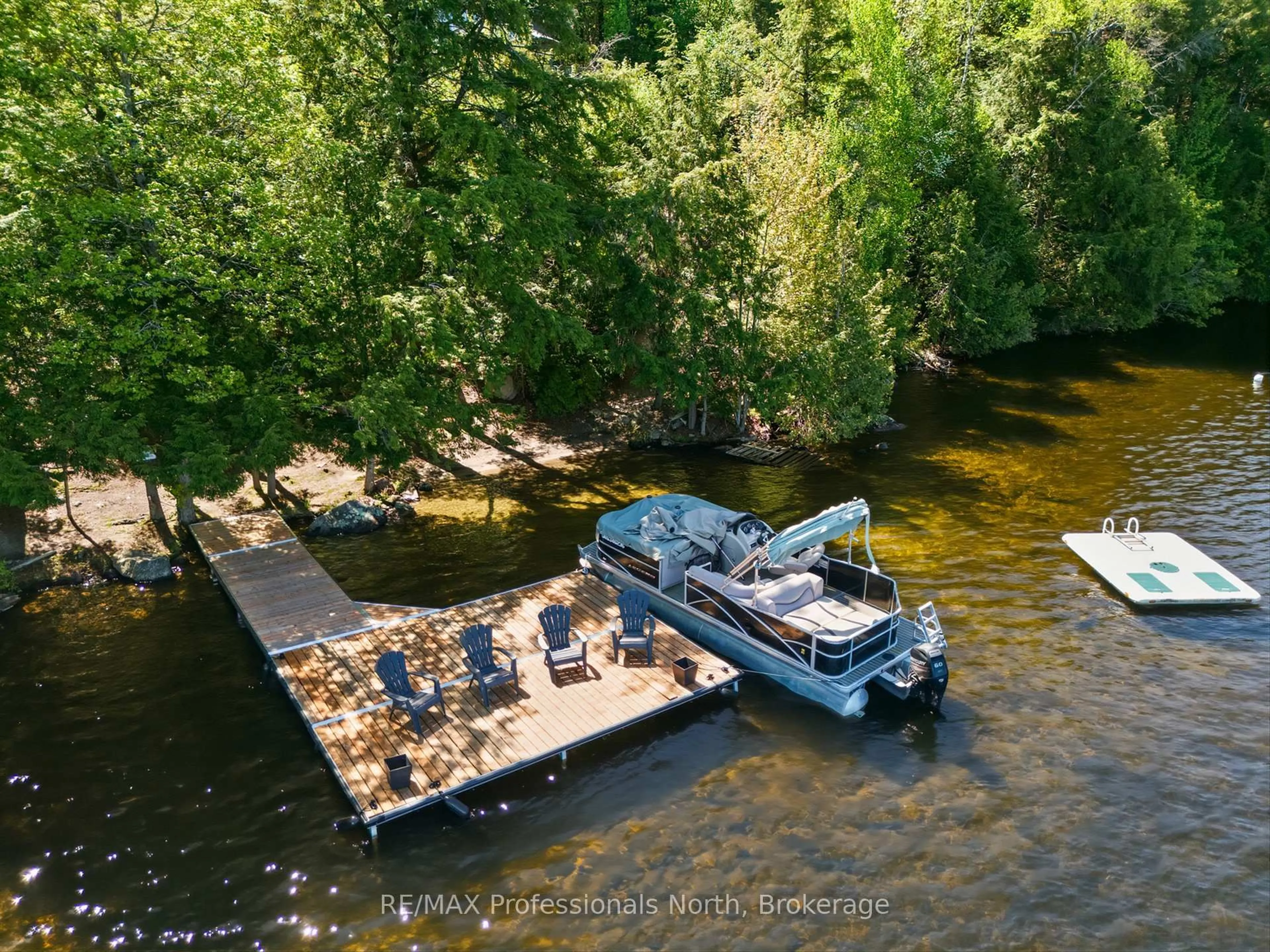 A pic from outside/outdoor area/front of a property/back of a property/a pic from drone, water/lake/river/ocean view for 20 Macbeth Island, Bracebridge Ontario P1L 1X3
