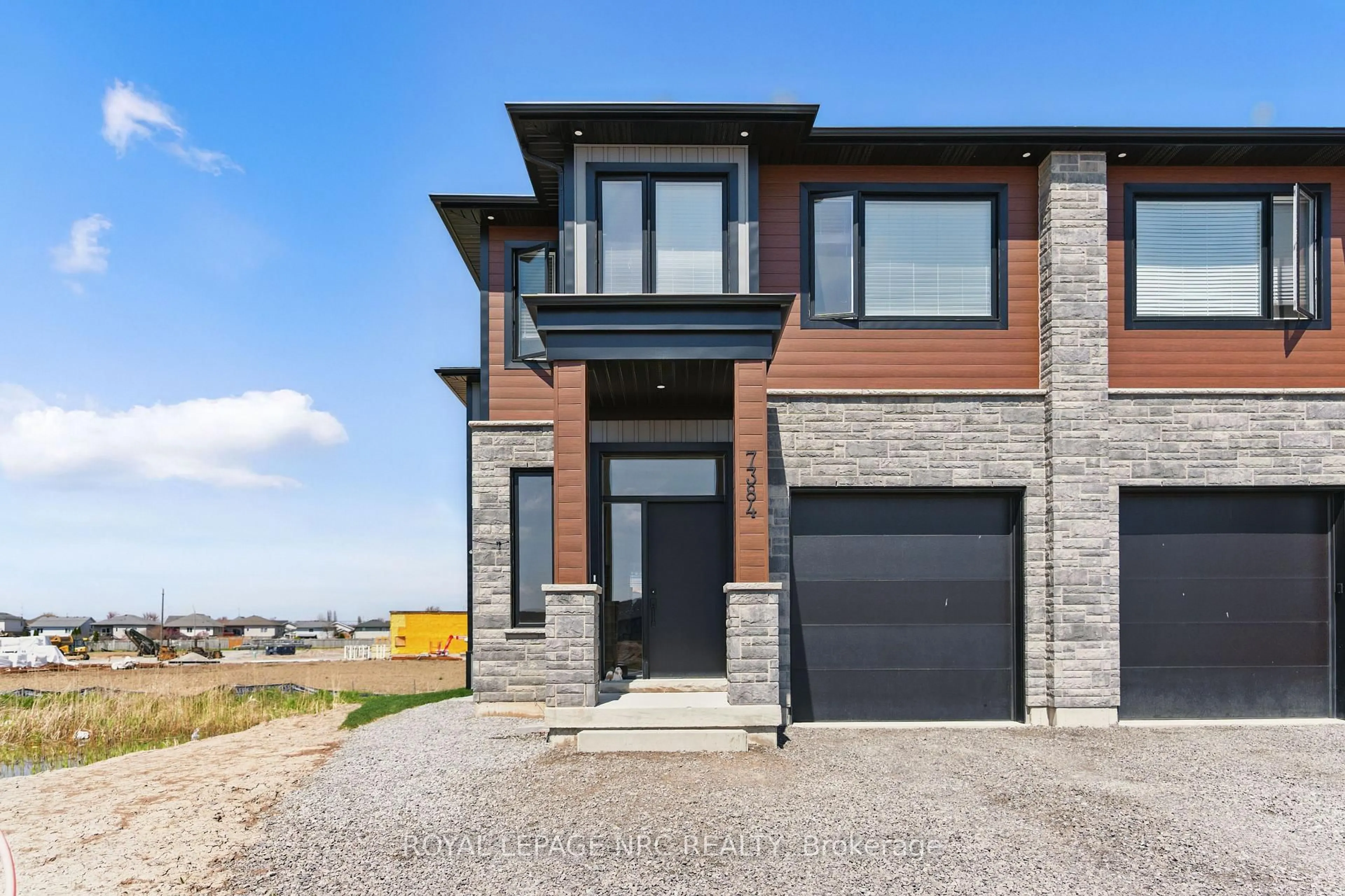 Home with brick exterior material, street for 7384 Splendour Dr, Niagara Falls Ontario L2H 3V8