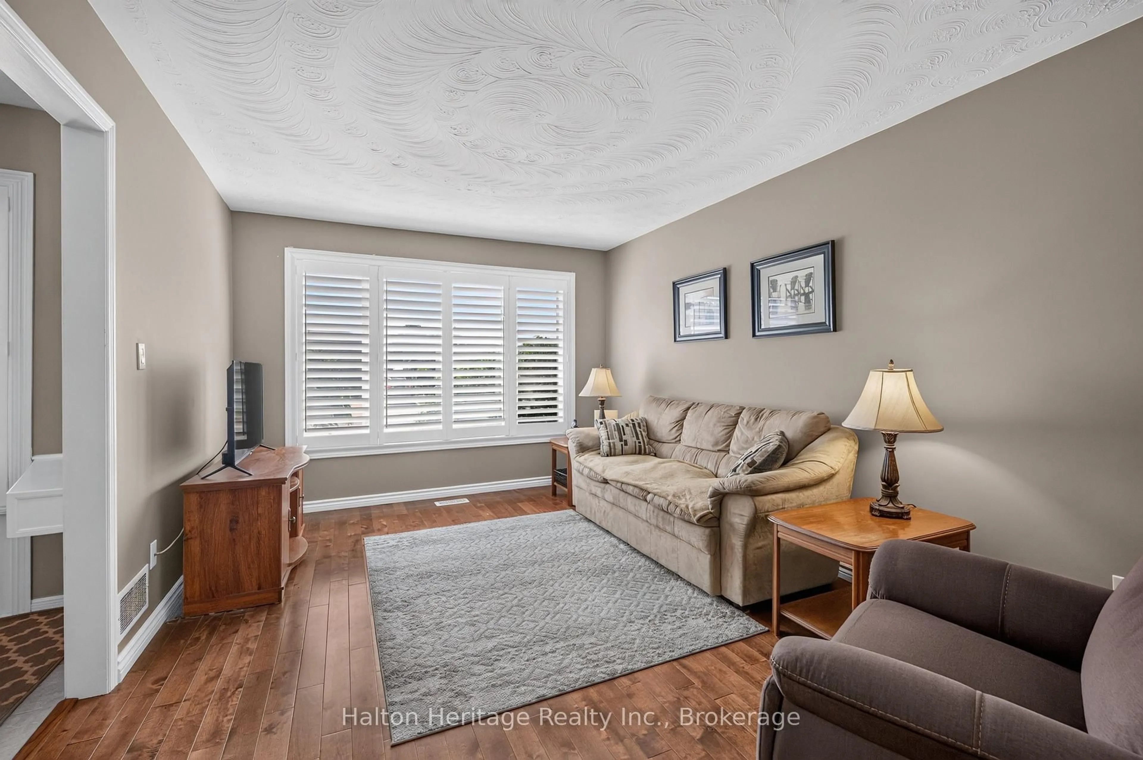 Living room with furniture, unknown for 400 Eaglewood Dr, Hamilton Ontario L8W 2S9