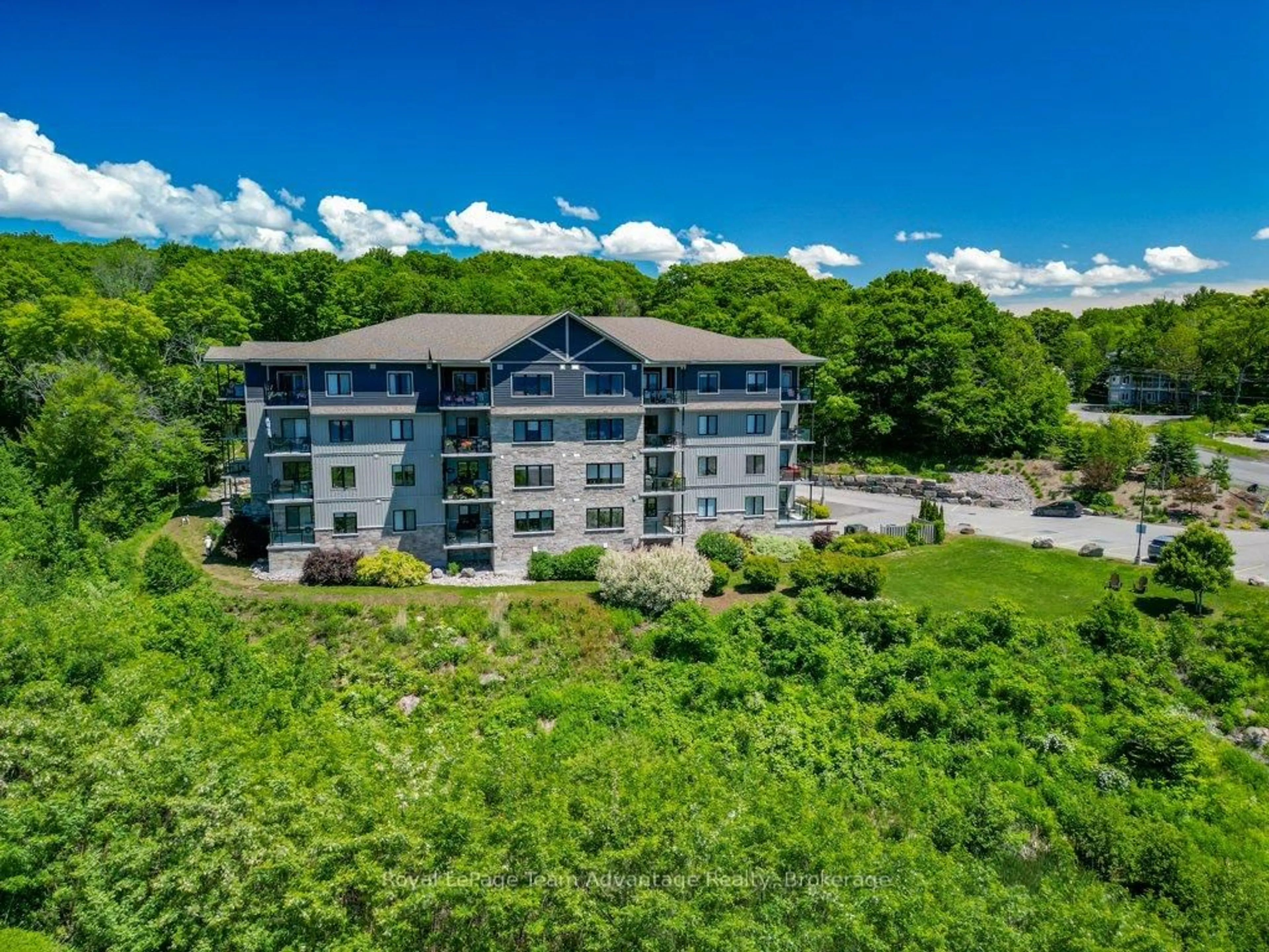 A pic from outside/outdoor area/front of a property/back of a property/a pic from drone, unknown for 11C Salt Dock Rd #303, Parry Sound Ontario P2A 2W9