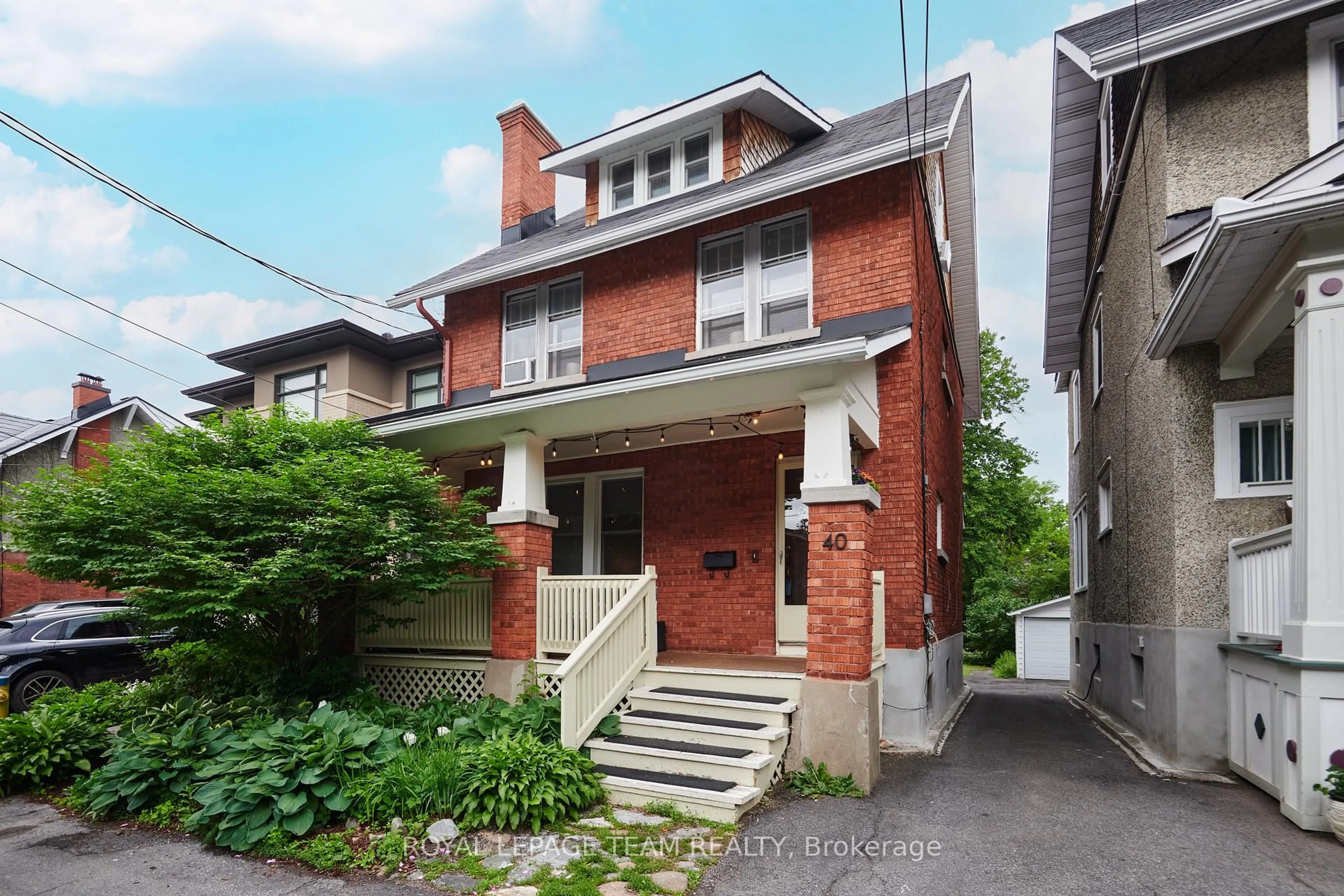 Home with brick exterior material, street for 40 Grosvenor Ave, Ottawa Ontario K1S 4S2