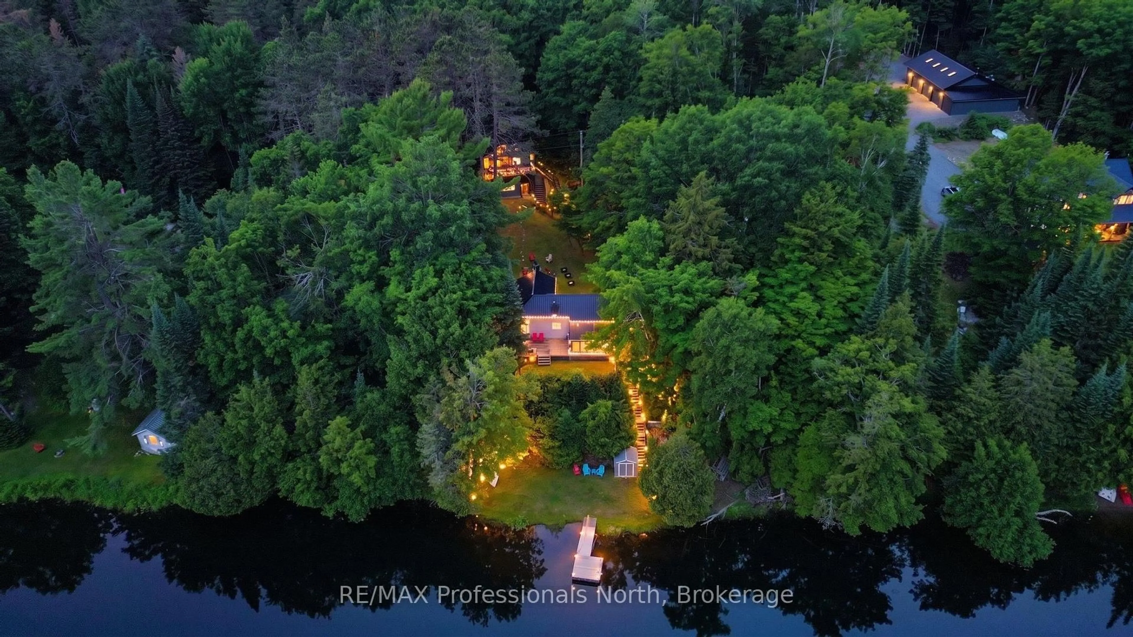 A pic from outside/outdoor area/front of a property/back of a property/a pic from drone, water/lake/river/ocean view for 3701 Gelert Rd, Minden Hills Ontario K0M 2K0