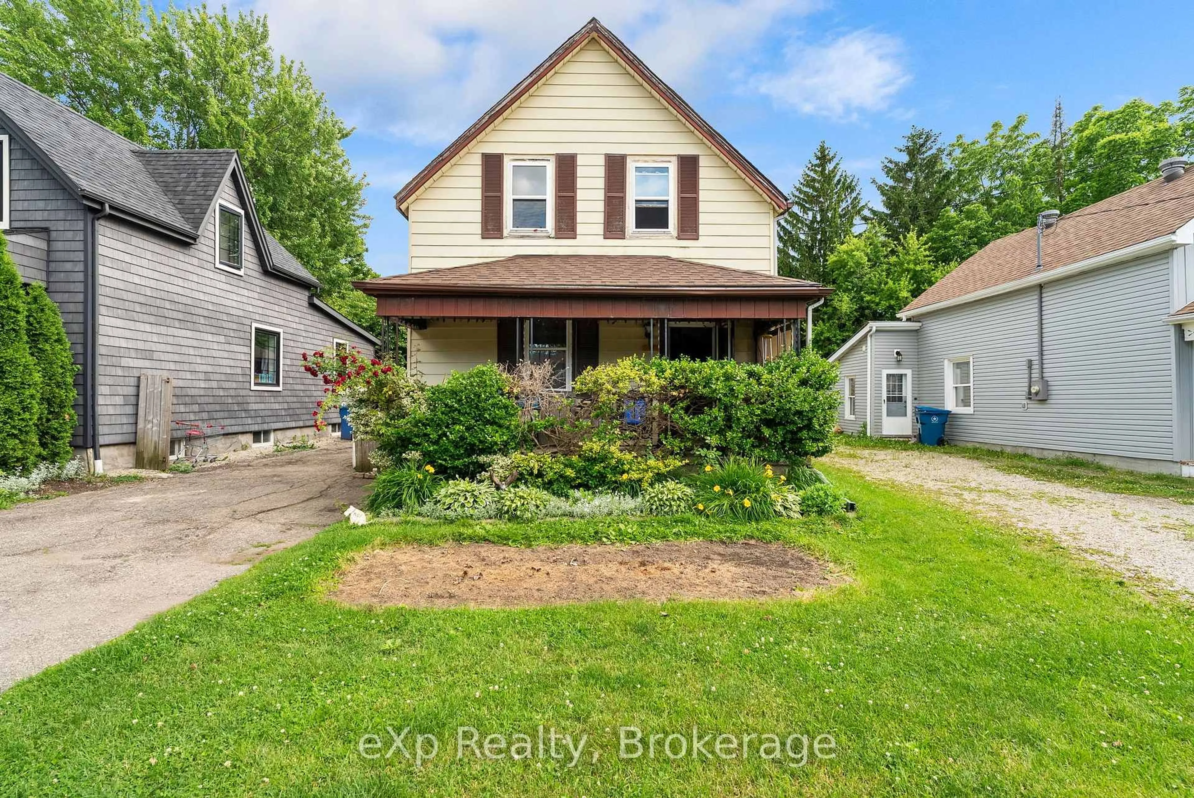 A pic from outside/outdoor area/front of a property/back of a property/a pic from drone, street for 99 Rebecca St, Stratford Ontario N5A 3P4