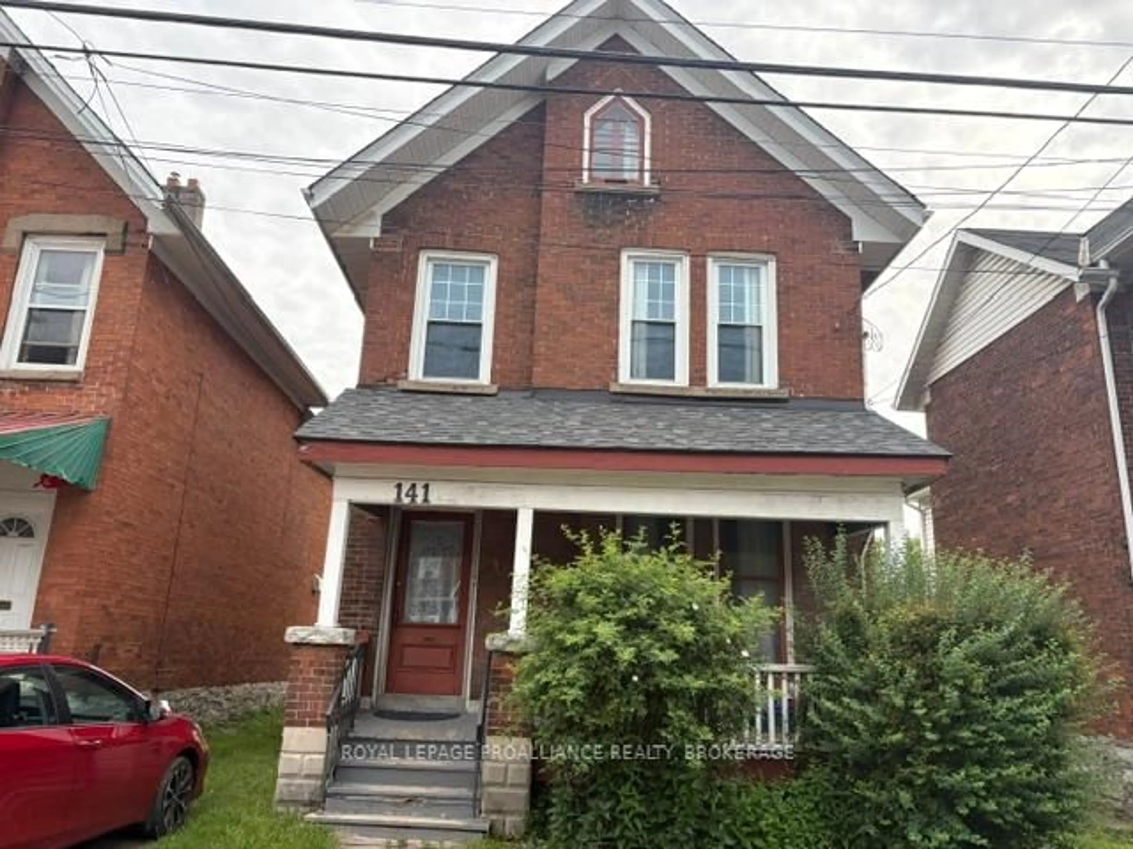 Home with brick exterior material, street for 141 Colborne St, Kingston Ontario K7K 1E1