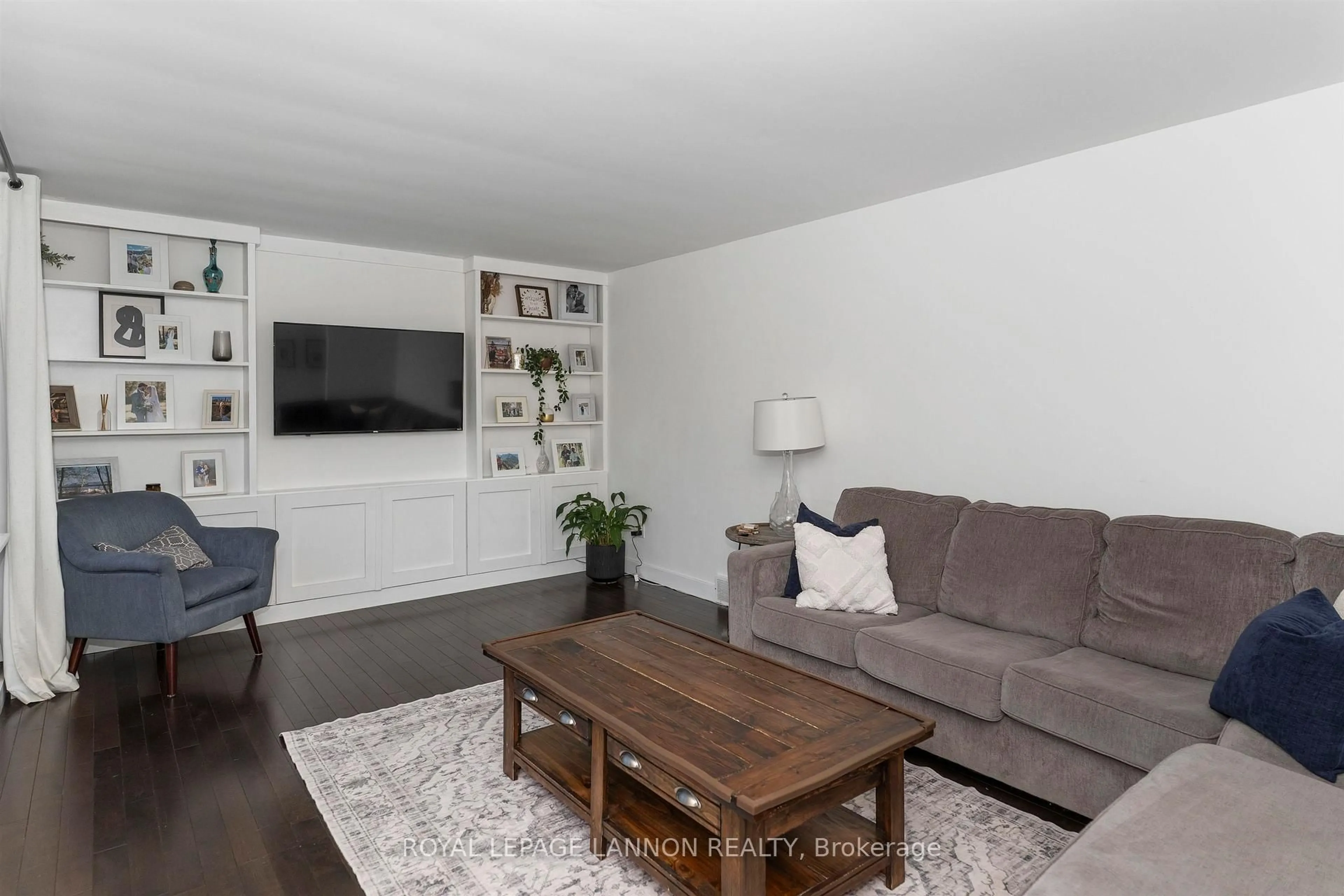 Living room with furniture, wood/laminate floor for 79 VERA Ave, Thunder Bay Ontario P7A 6T7