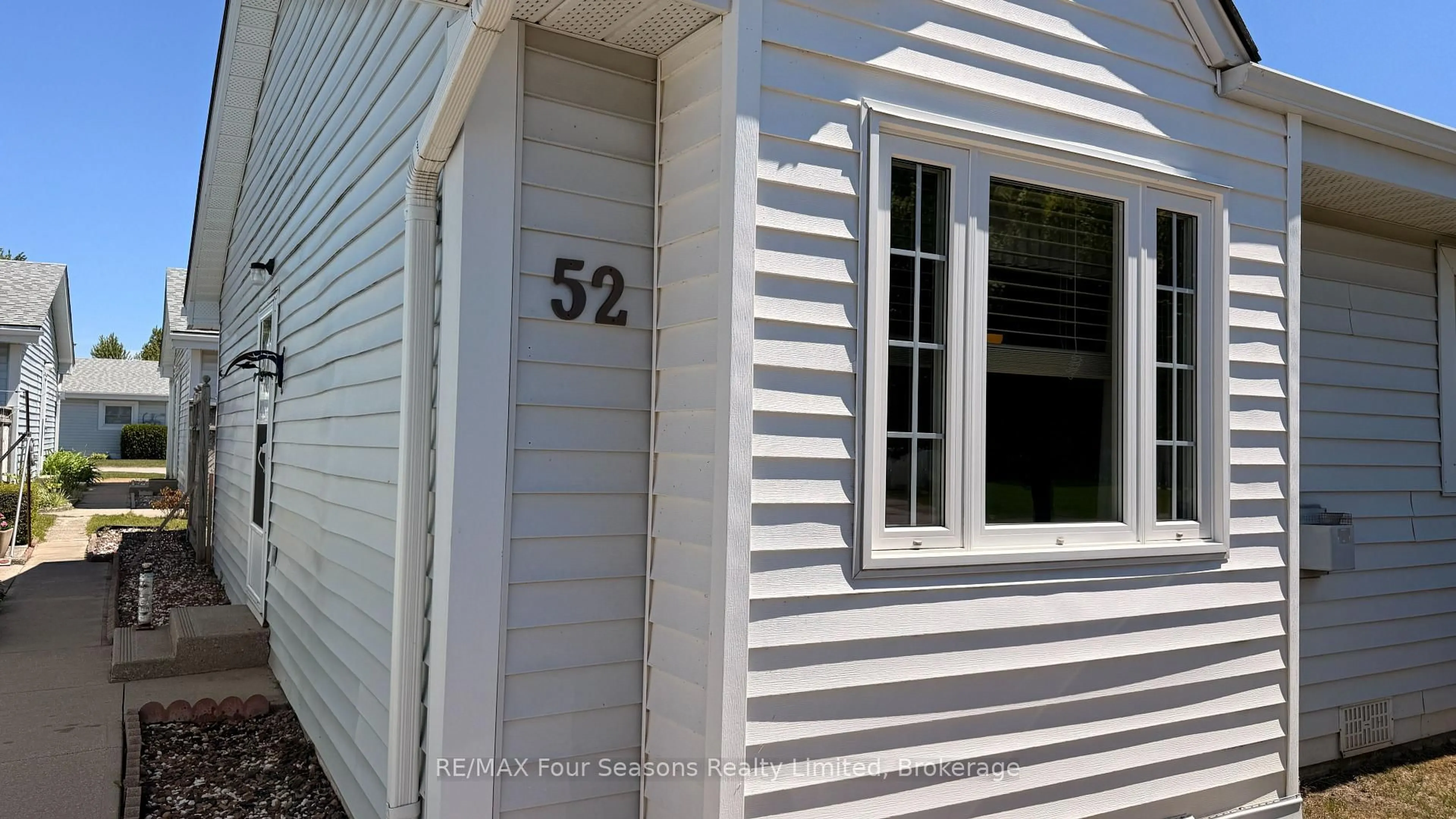 Home with vinyl exterior material, street for 303 Waterloo St #52, Saugeen Shores Ontario N0H 2C1