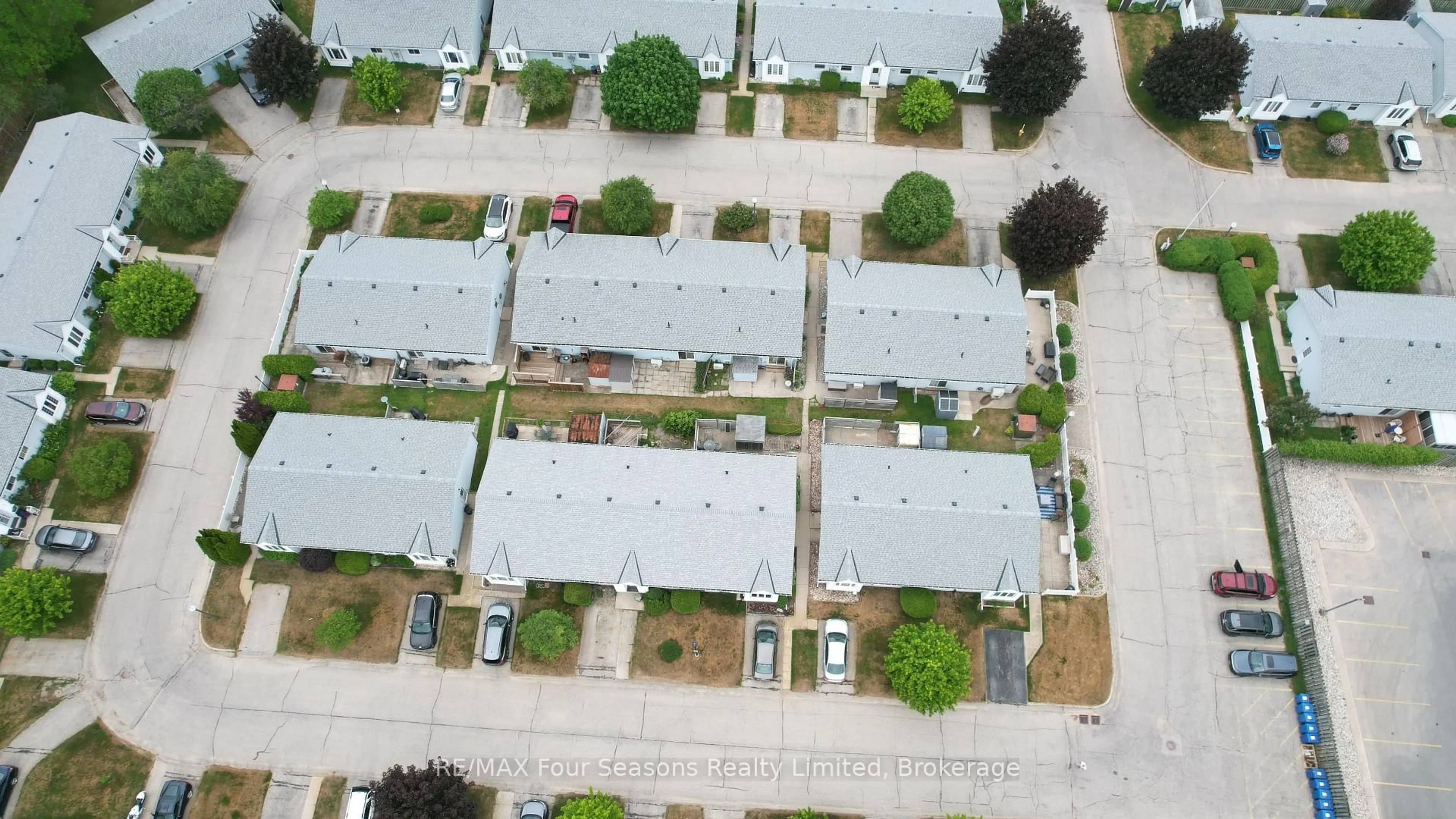 A pic from outside/outdoor area/front of a property/back of a property/a pic from drone, street for 303 Waterloo St #52, Saugeen Shores Ontario N0H 2C1