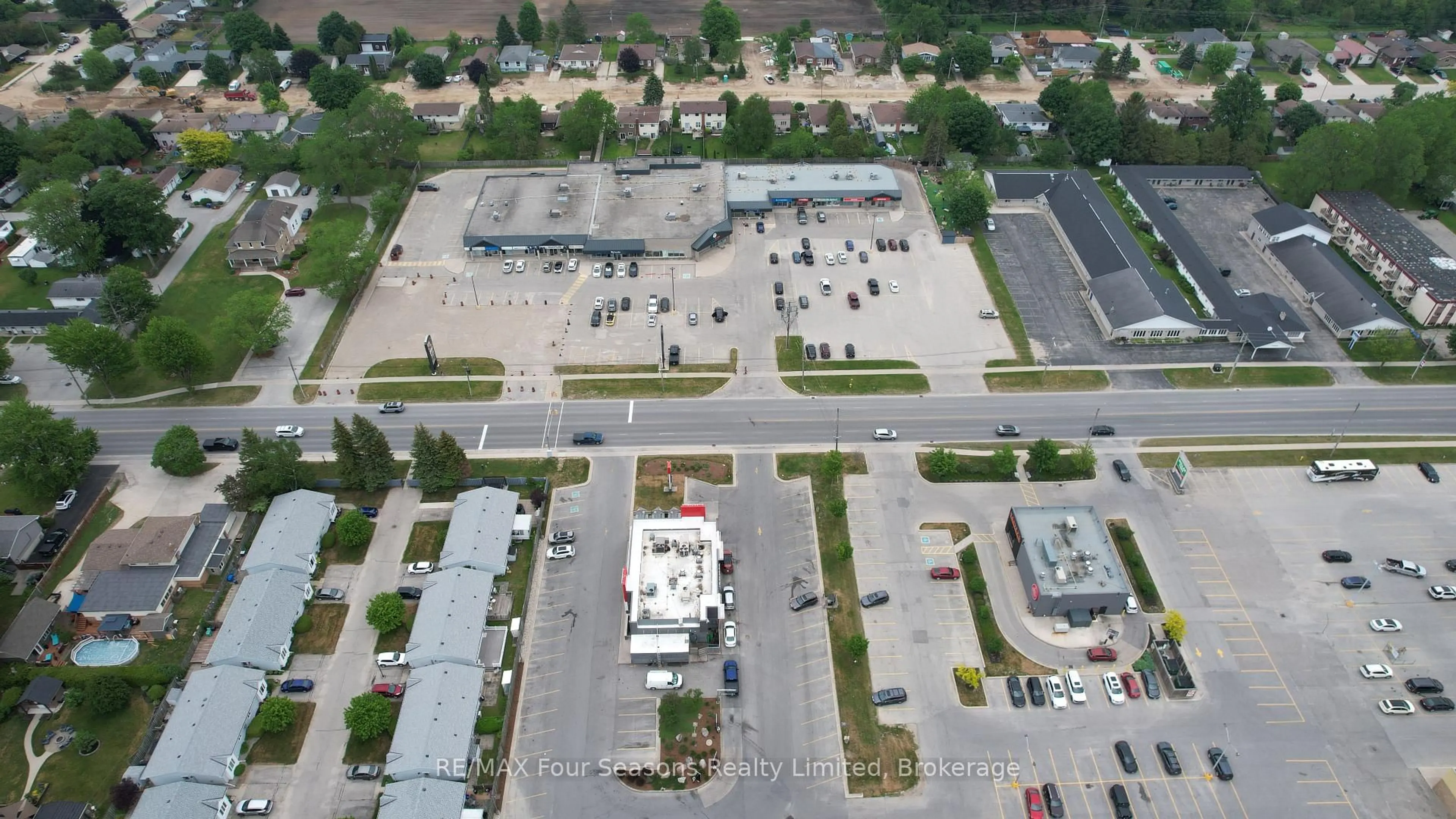 A pic from outside/outdoor area/front of a property/back of a property/a pic from drone, street for 303 Waterloo St #52, Saugeen Shores Ontario N0H 2C1