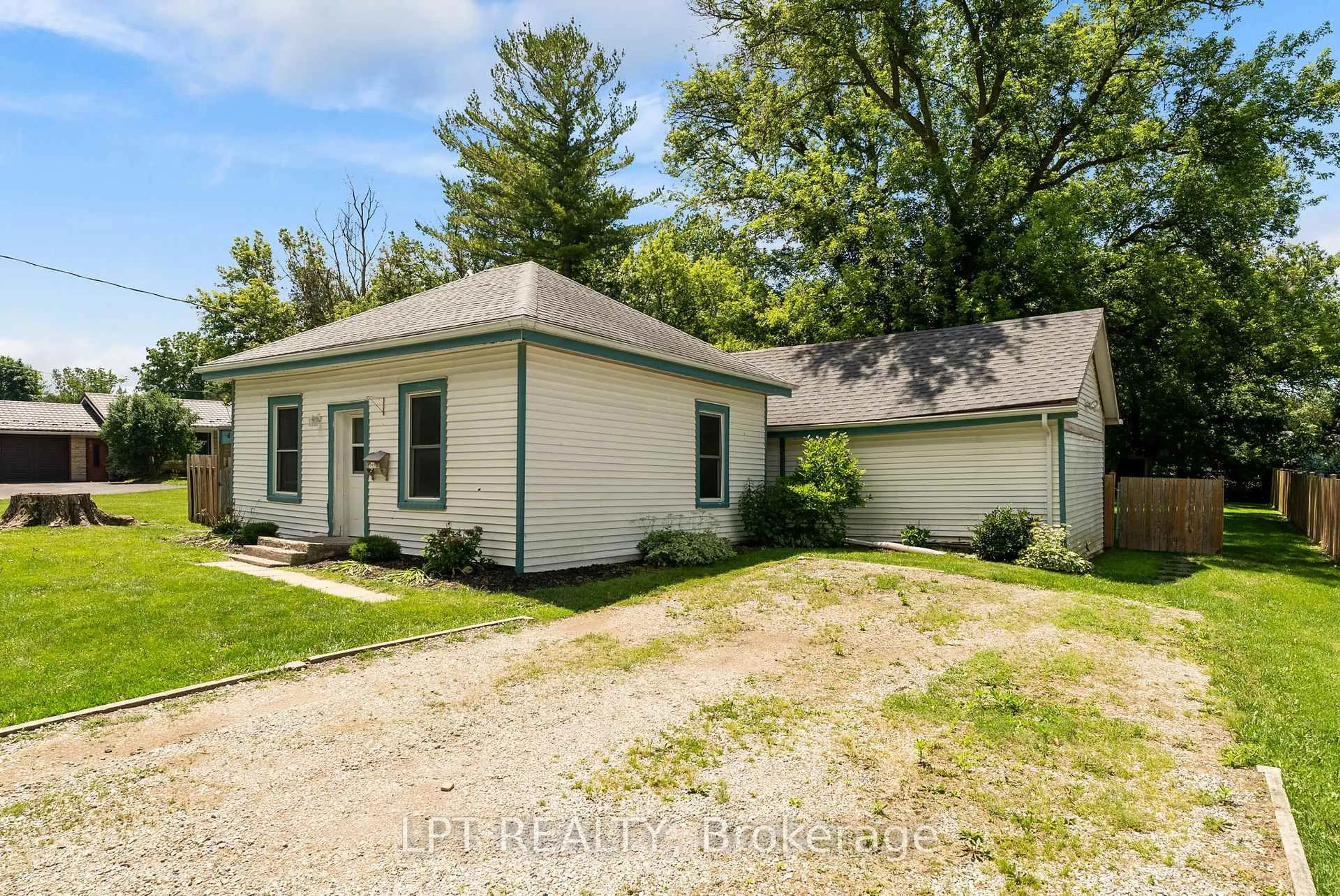 A pic from outside/outdoor area/front of a property/back of a property/a pic from drone, street for 269 Richmond St, North Middlesex Ontario N0M 2K0