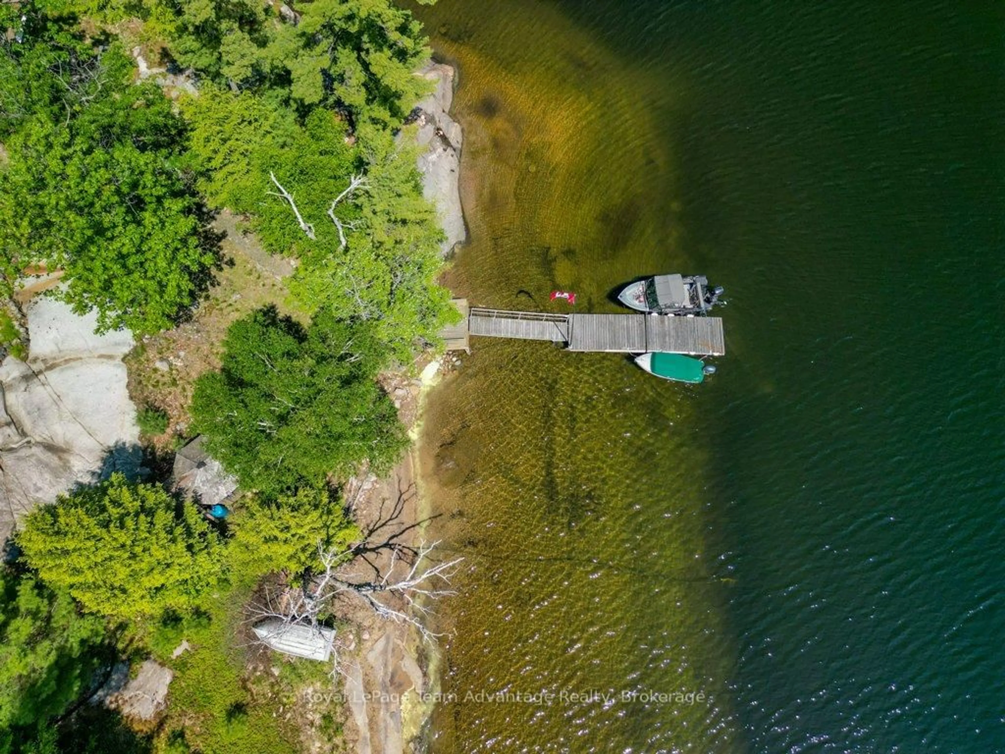 A pic from outside/outdoor area/front of a property/back of a property/a pic from drone, water/lake/river/ocean view for 3 Island 19C, Carling Ontario P0G 1G0