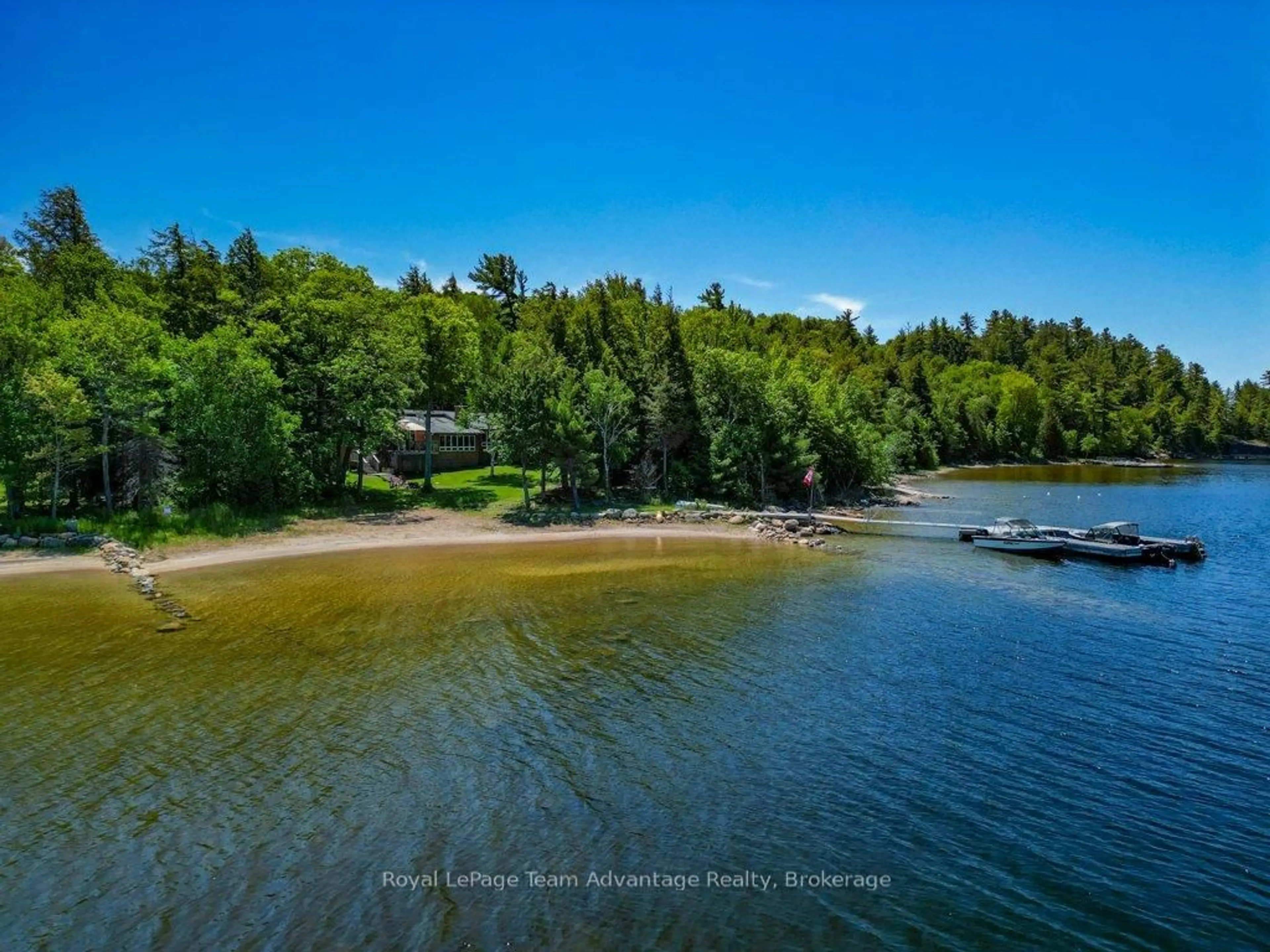 A pic from outside/outdoor area/front of a property/back of a property/a pic from drone, water/lake/river/ocean view for 25 Island 20C, Carling Ontario P0G 1G0