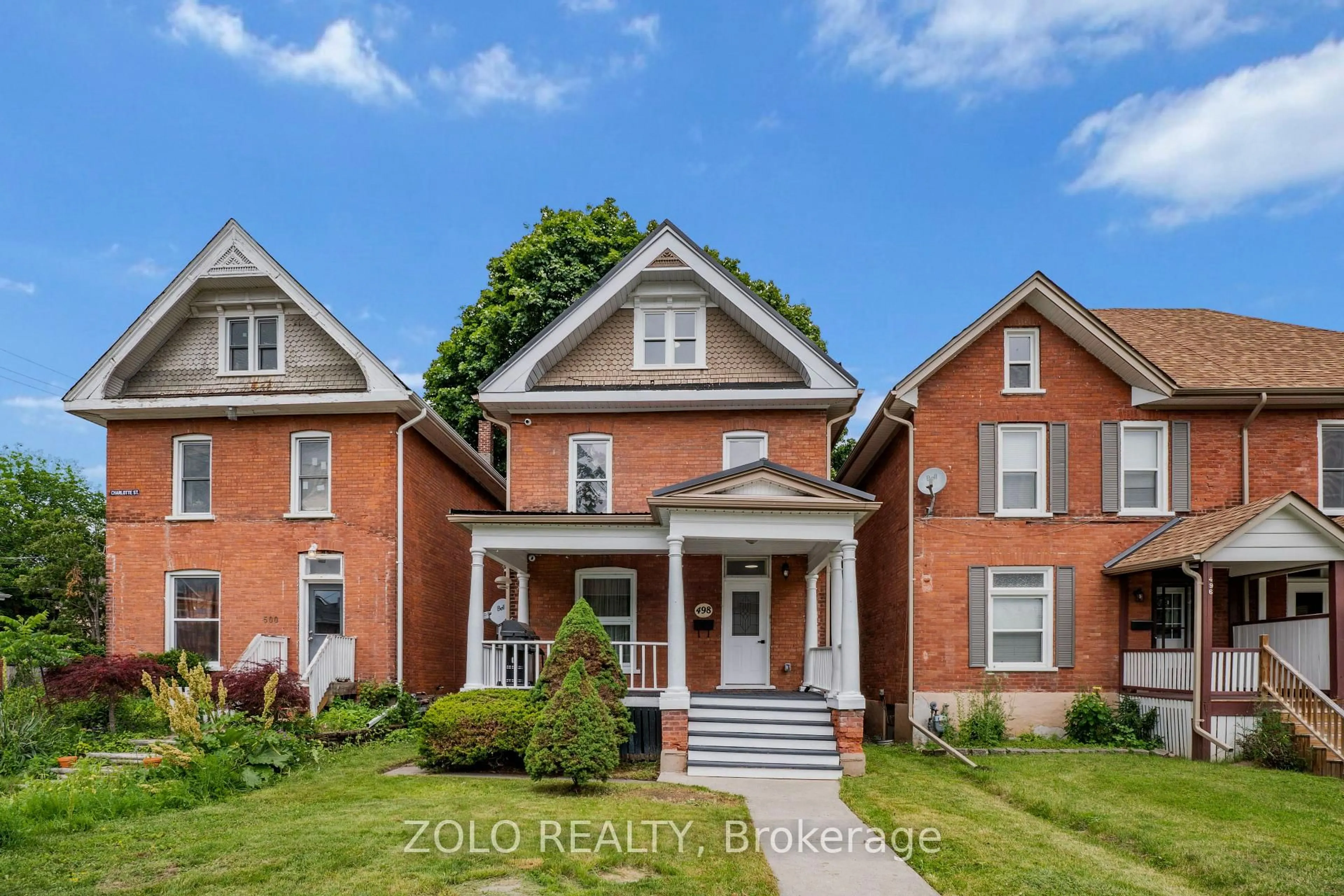 Home with brick exterior material, street for 498 Charlotte St, Peterborough Ontario K9J 2W3