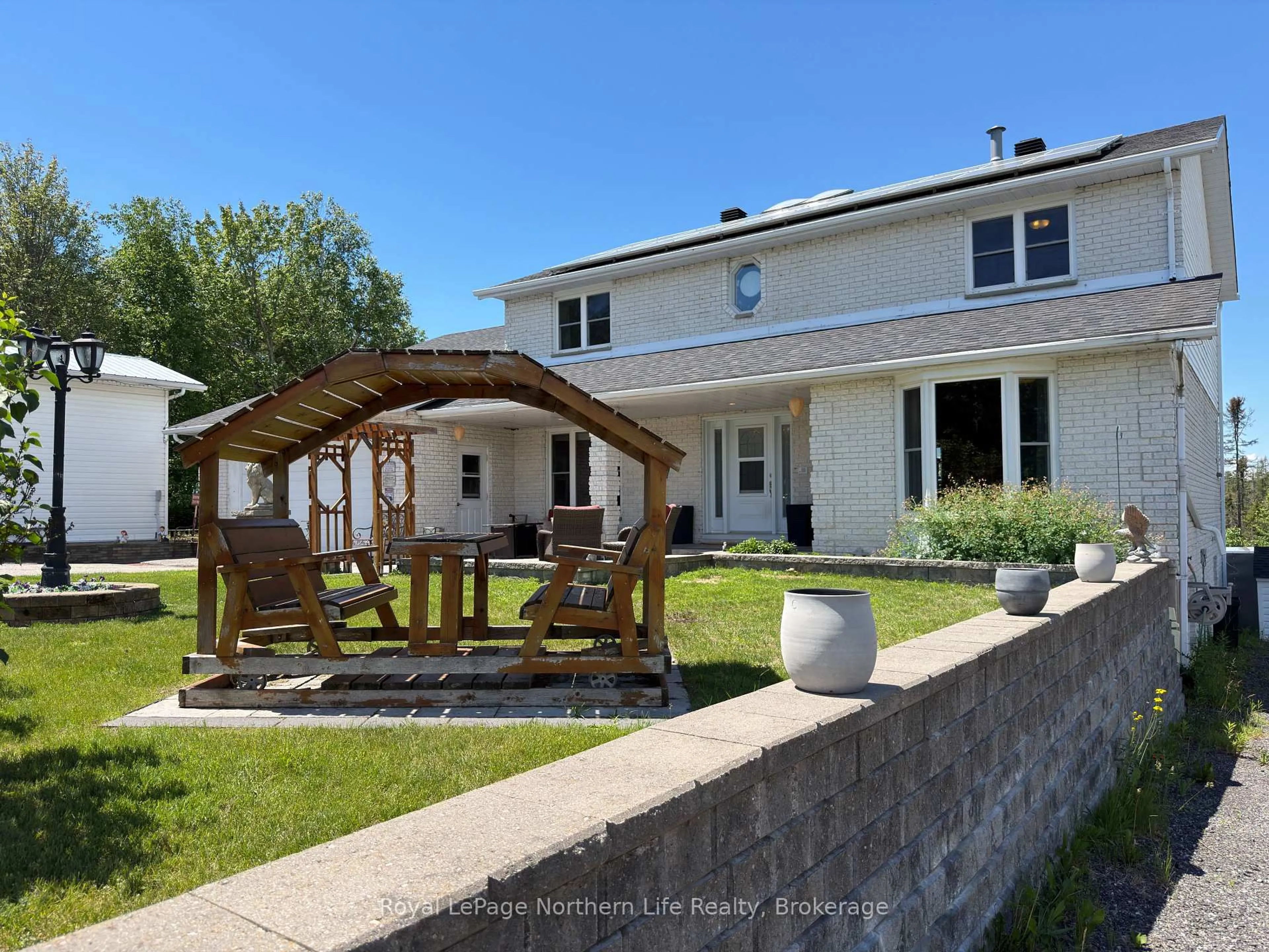 A pic from outside/outdoor area/front of a property/back of a property/a pic from drone, building for 3235 Highway 11, North Bay Ontario P1B 8G3