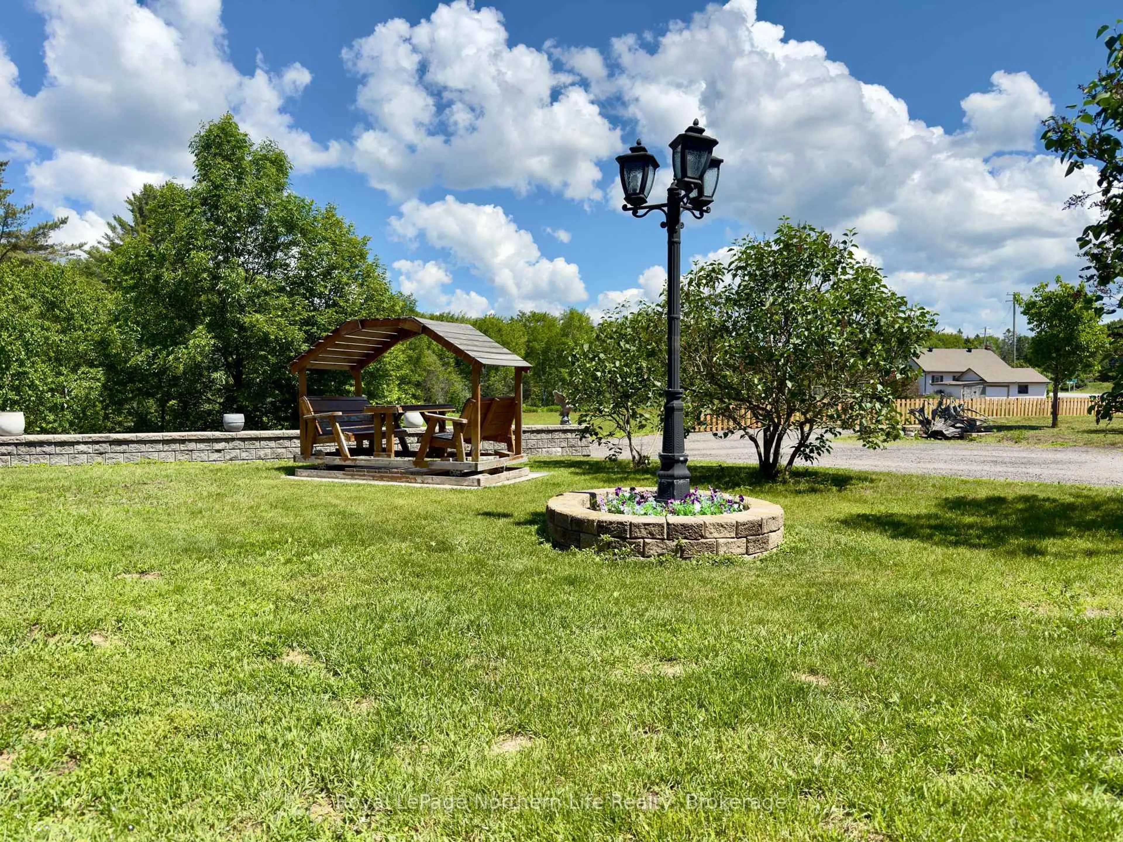 A pic from outside/outdoor area/front of a property/back of a property/a pic from drone, water/lake/river/ocean view for 3235 Highway 11, North Bay Ontario P1B 8G3