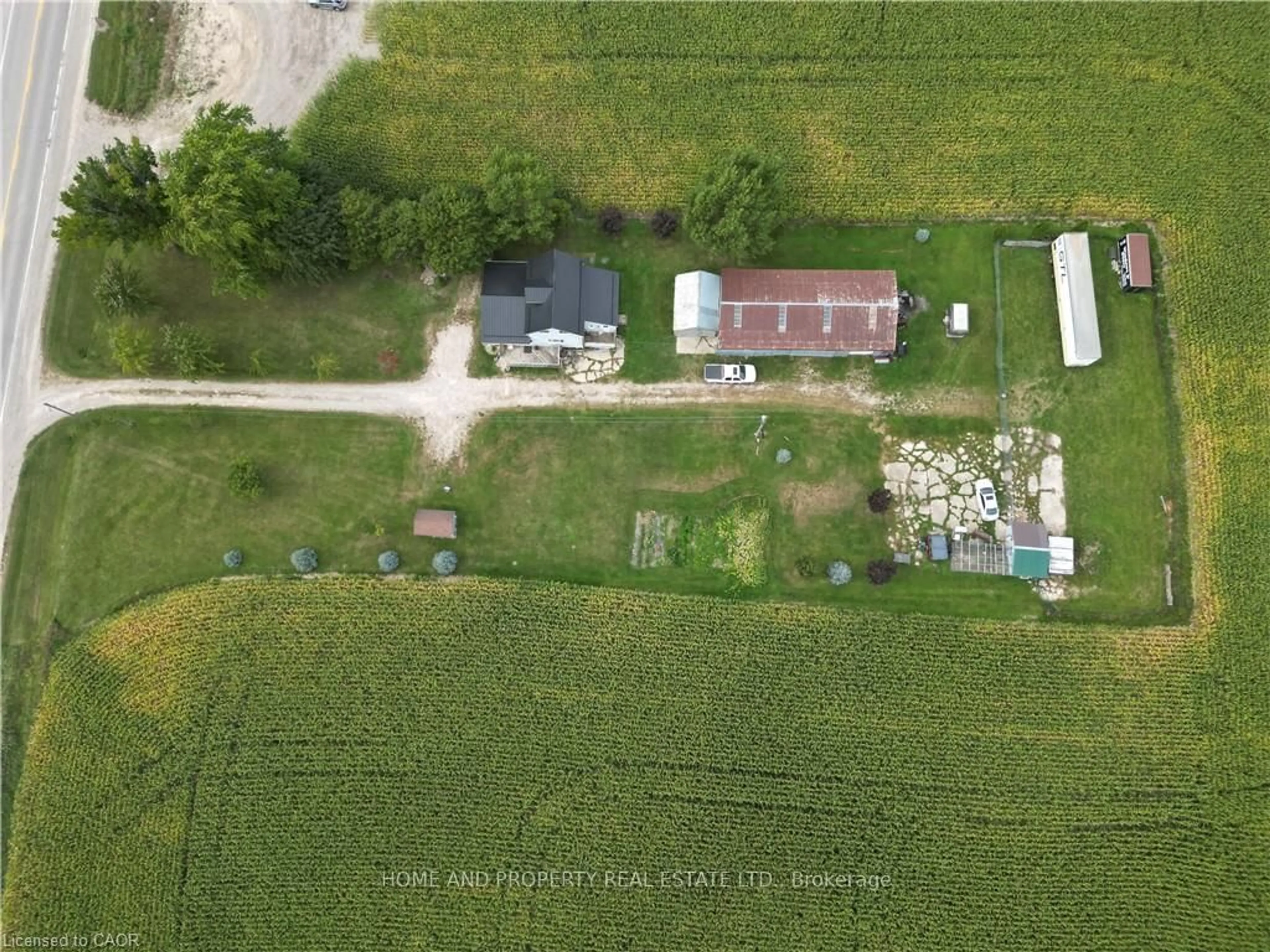 A pic from outside/outdoor area/front of a property/back of a property/a pic from drone, street for 1716 Bruce Rd 86, Huron-Kinloss Ontario N0G 2H0
