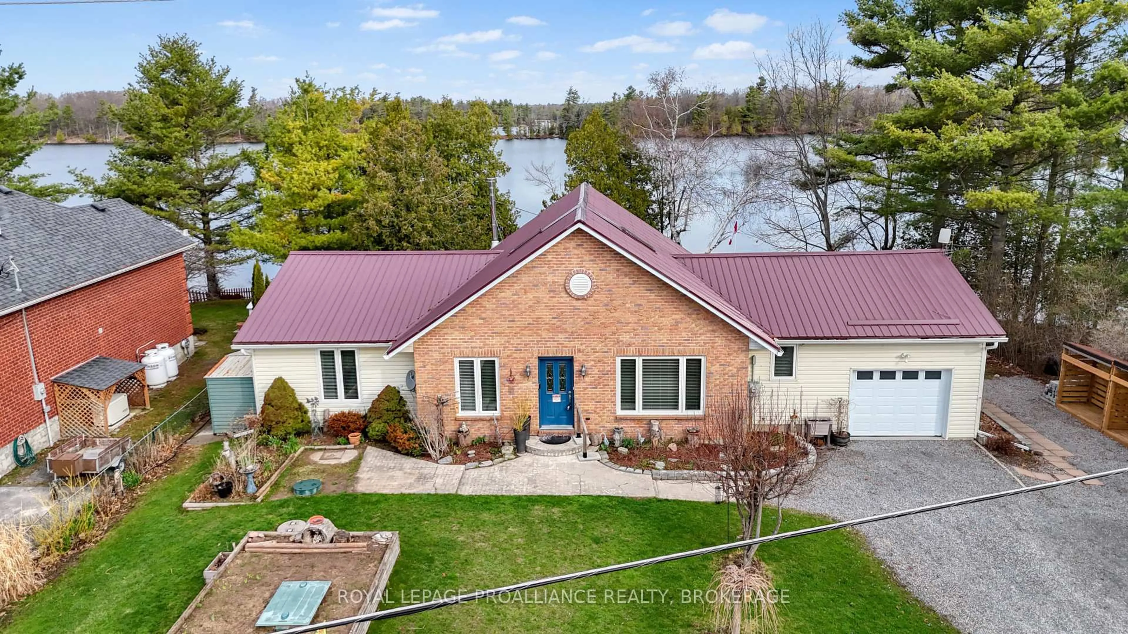 A pic from outside/outdoor area/front of a property/back of a property/a pic from drone, water/lake/river/ocean view for 4909 Alex Mclean Lane, Battersea Ontario K0H 1H0