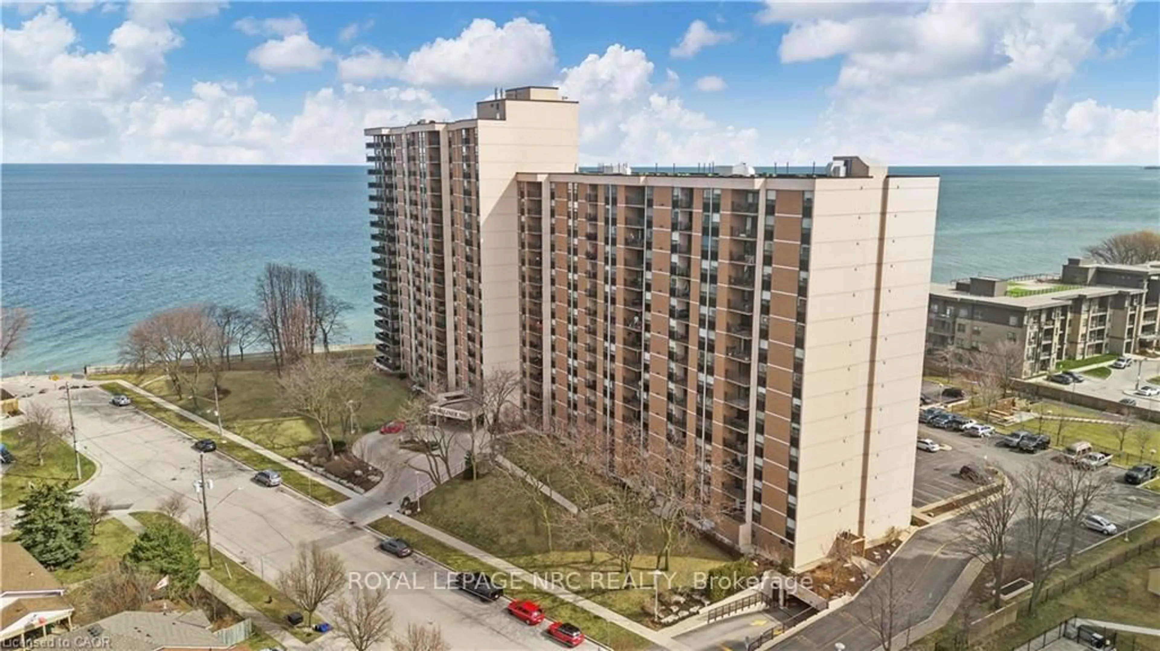 A pic from outside/outdoor area/front of a property/back of a property/a pic from drone, water/lake/river/ocean view for 500 GREEN Rd #1414, Hamilton Ontario L8E 3M6