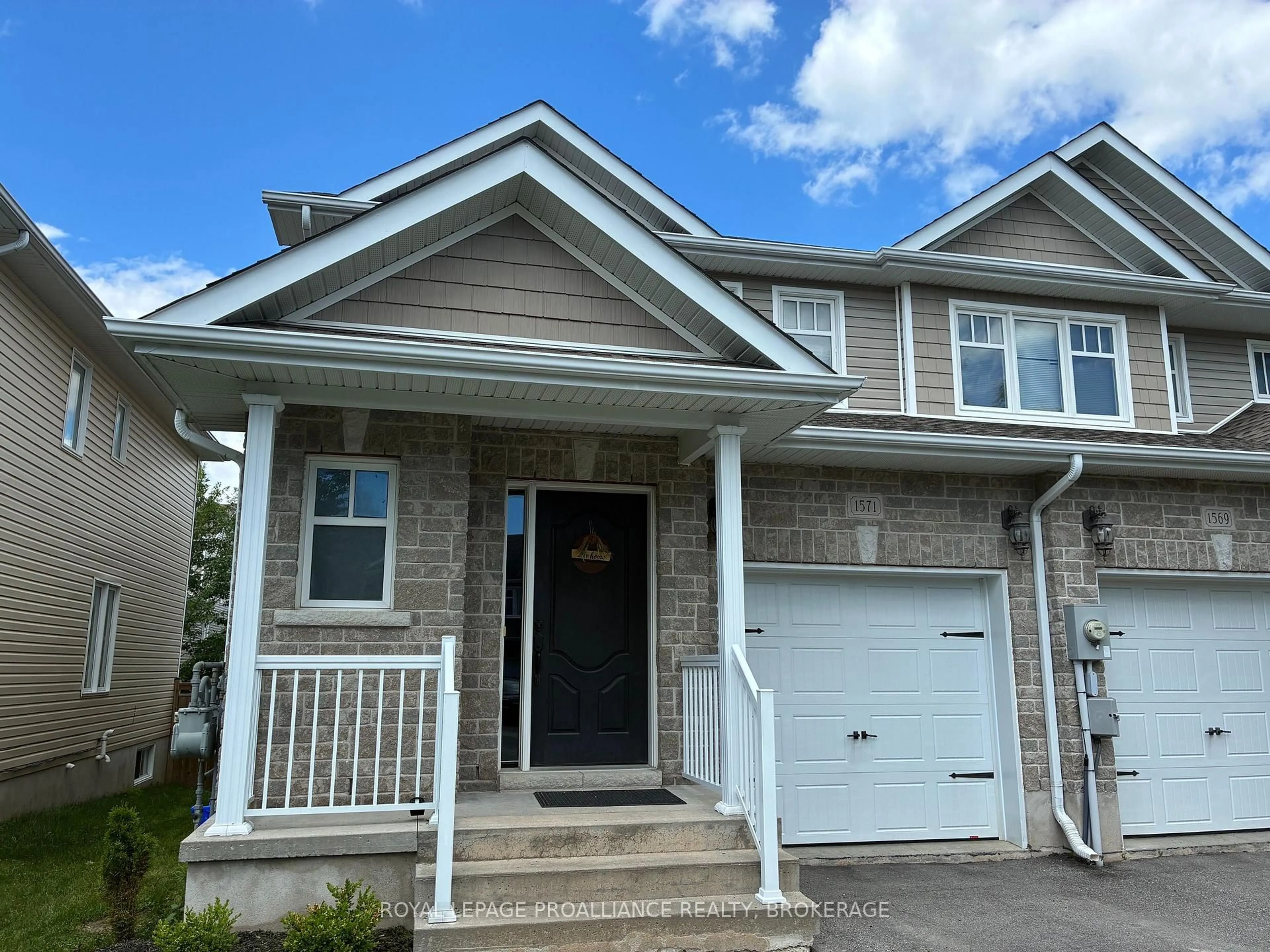 Home with vinyl exterior material, street for 1571 Crimson Cres, Kingston Ontario K7P 0J3