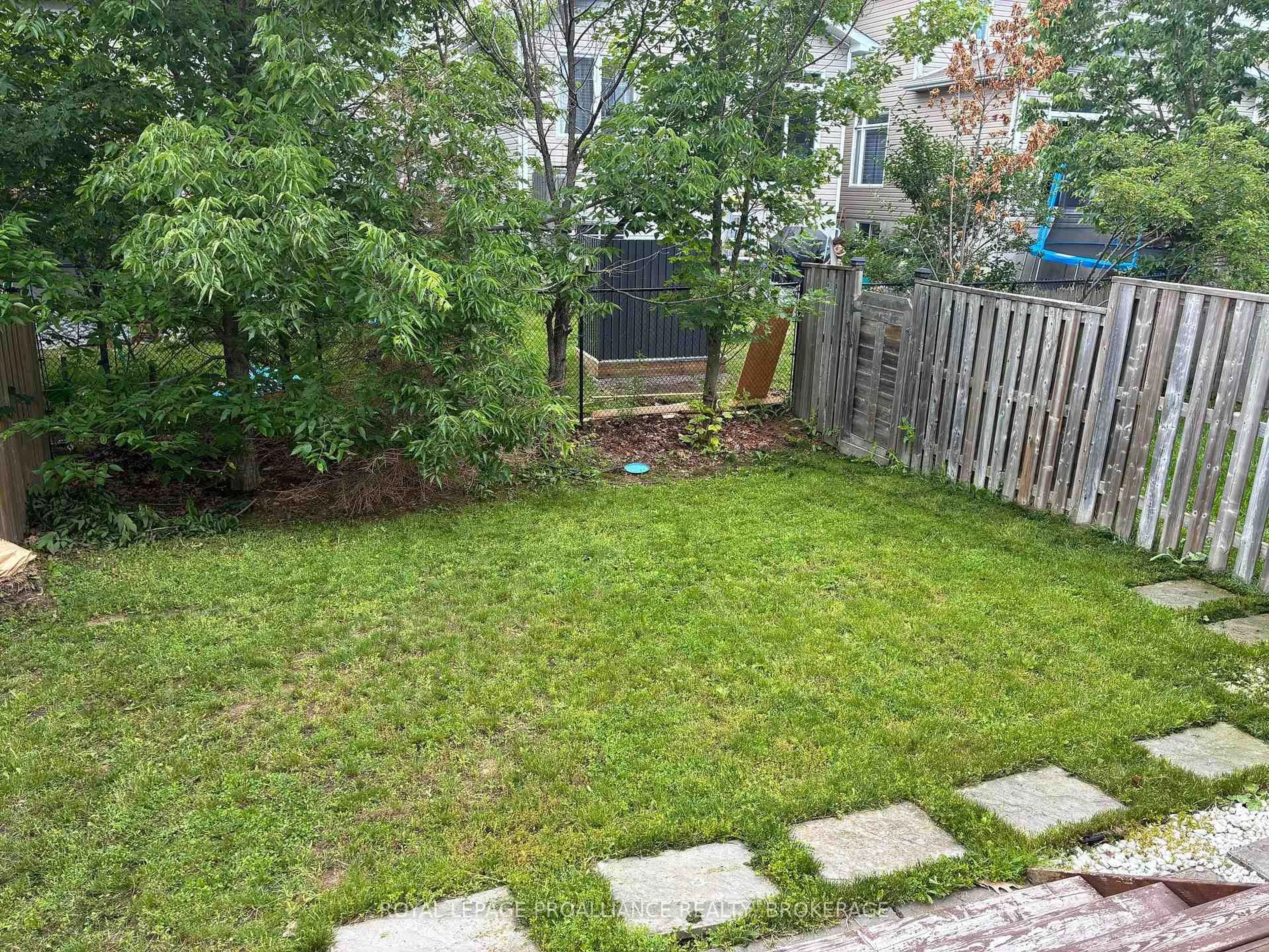 A pic from outside/outdoor area/front of a property/back of a property/a pic from drone, forest/trees view for 1571 Crimson Cres, Kingston Ontario K7P 0J3