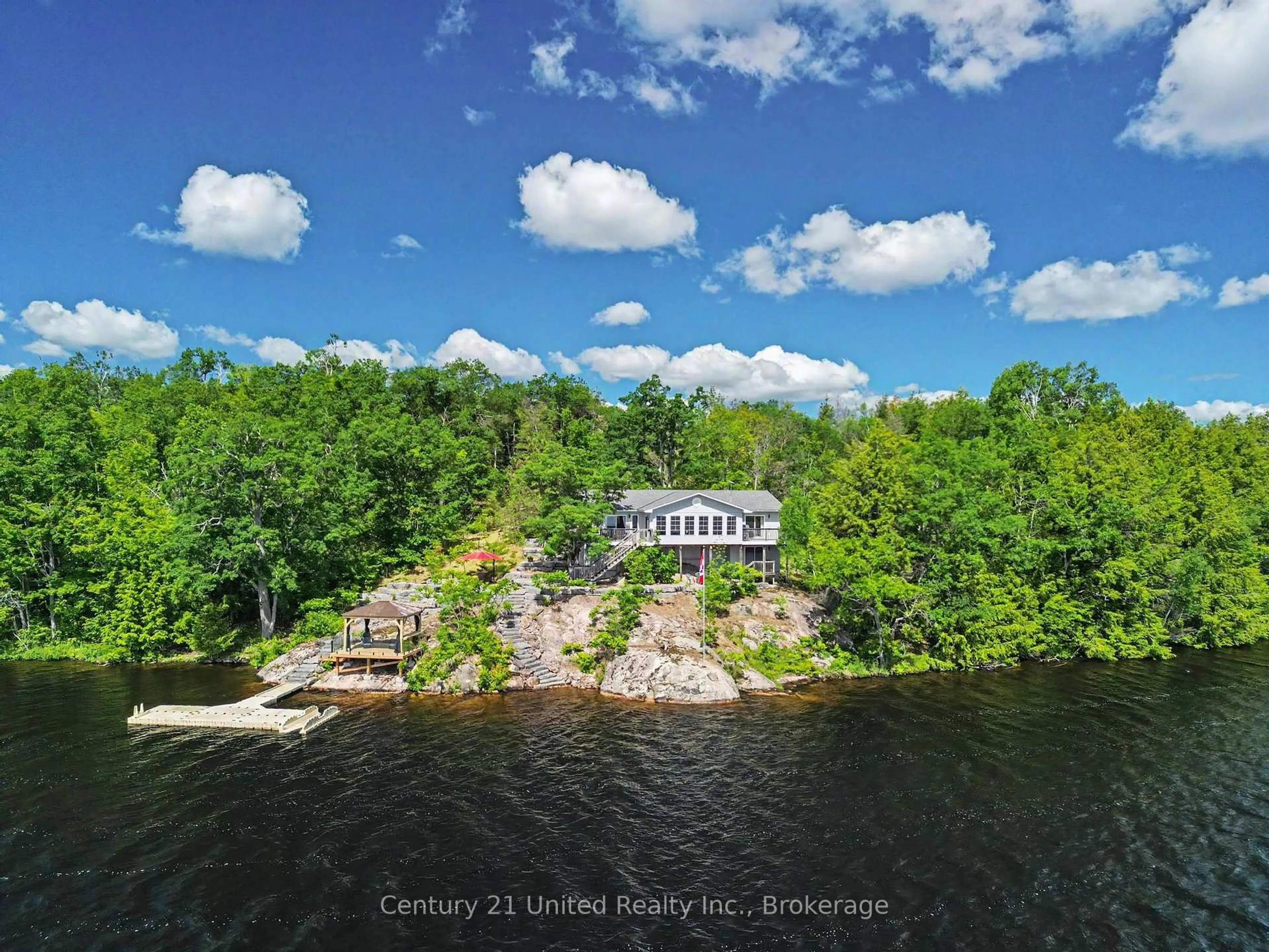 A pic from outside/outdoor area/front of a property/back of a property/a pic from drone, water/lake/river/ocean view for 36 Fire Route 141, Trent Lakes Ontario K0L 1J0