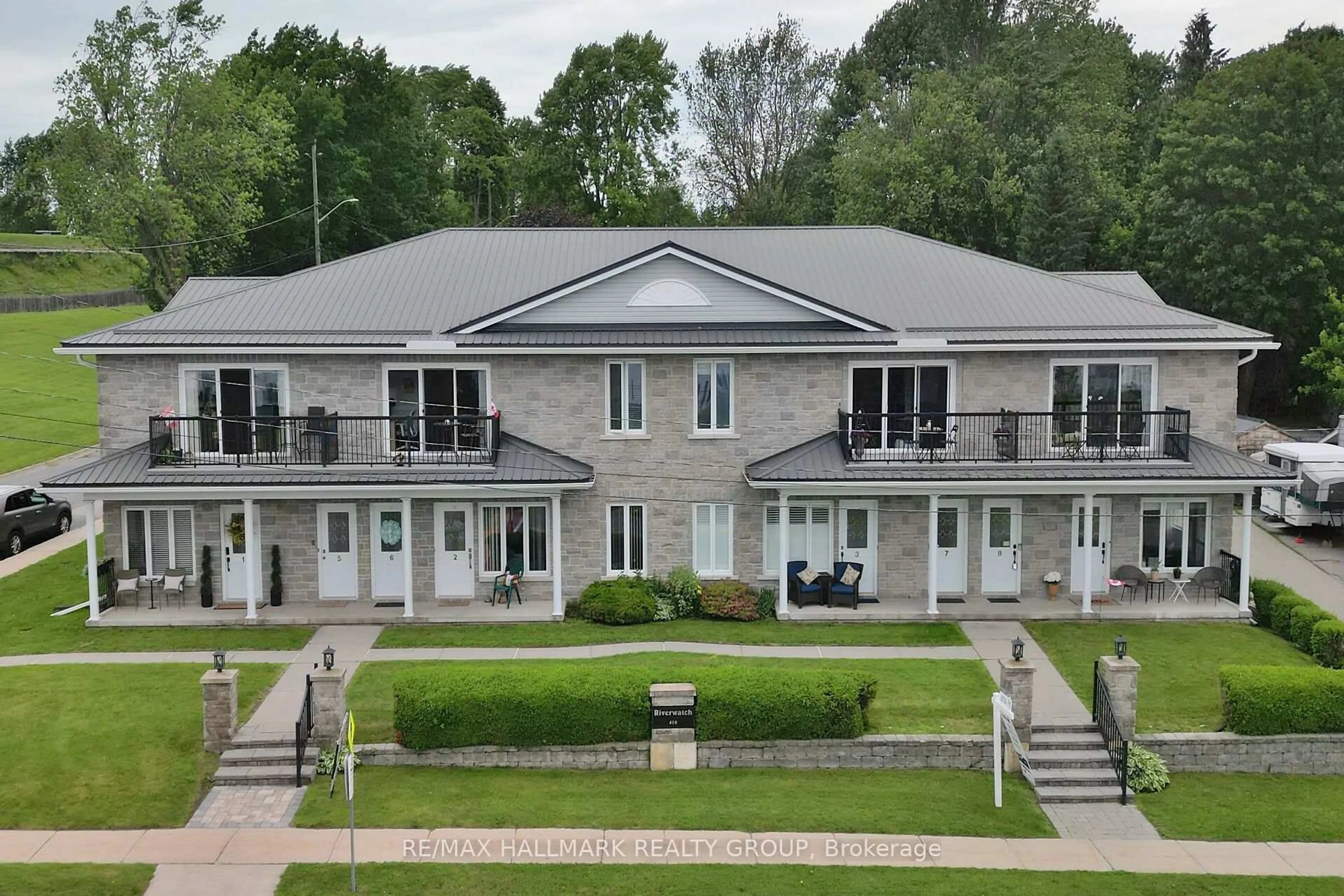 A pic from outside/outdoor area/front of a property/back of a property/a pic from drone, unknown for 410 King St #7, Prescott Ontario K0E 1T0