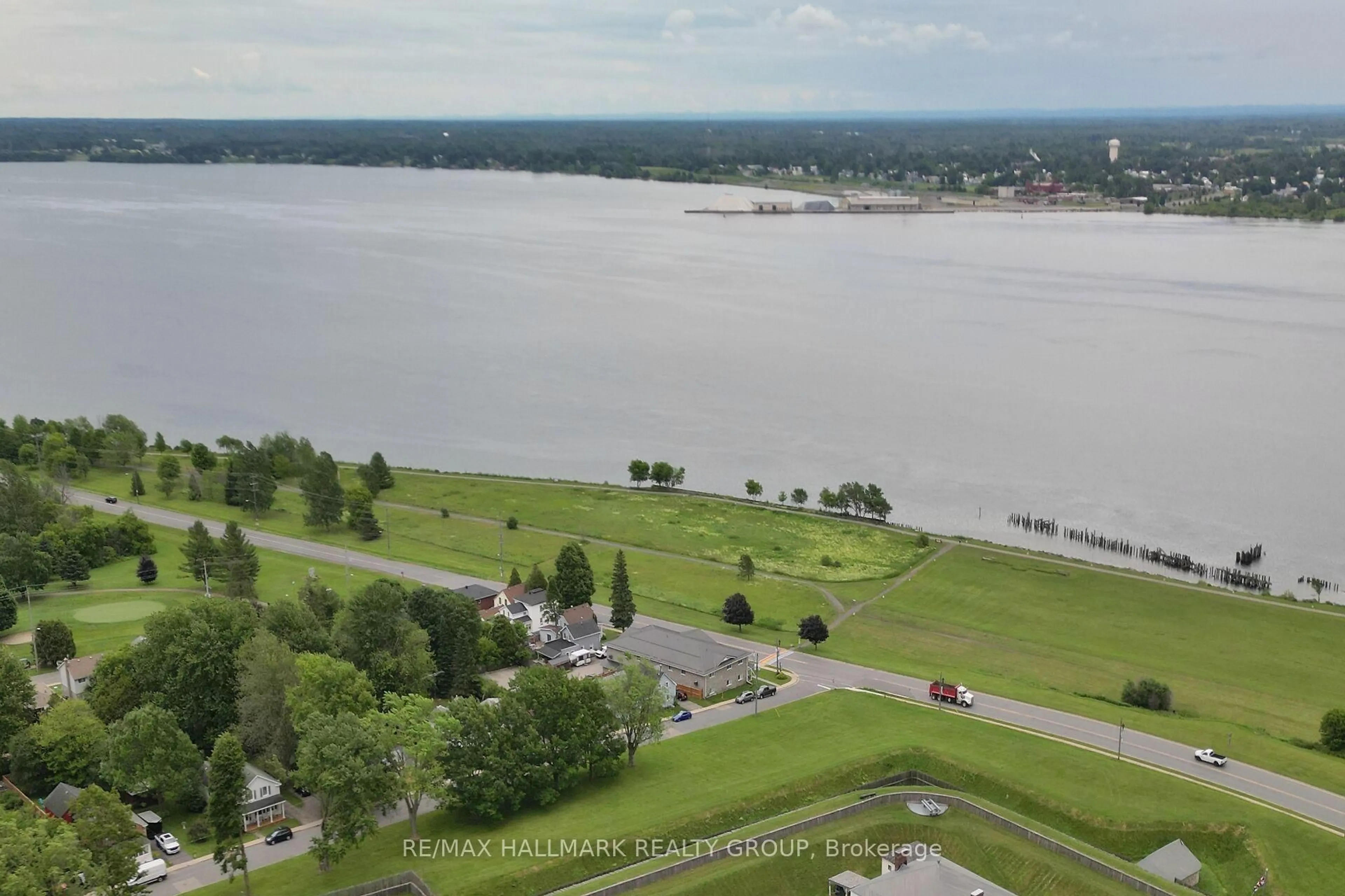 A pic from outside/outdoor area/front of a property/back of a property/a pic from drone, water/lake/river/ocean view for 410 King St #7, Prescott Ontario K0E 1T0