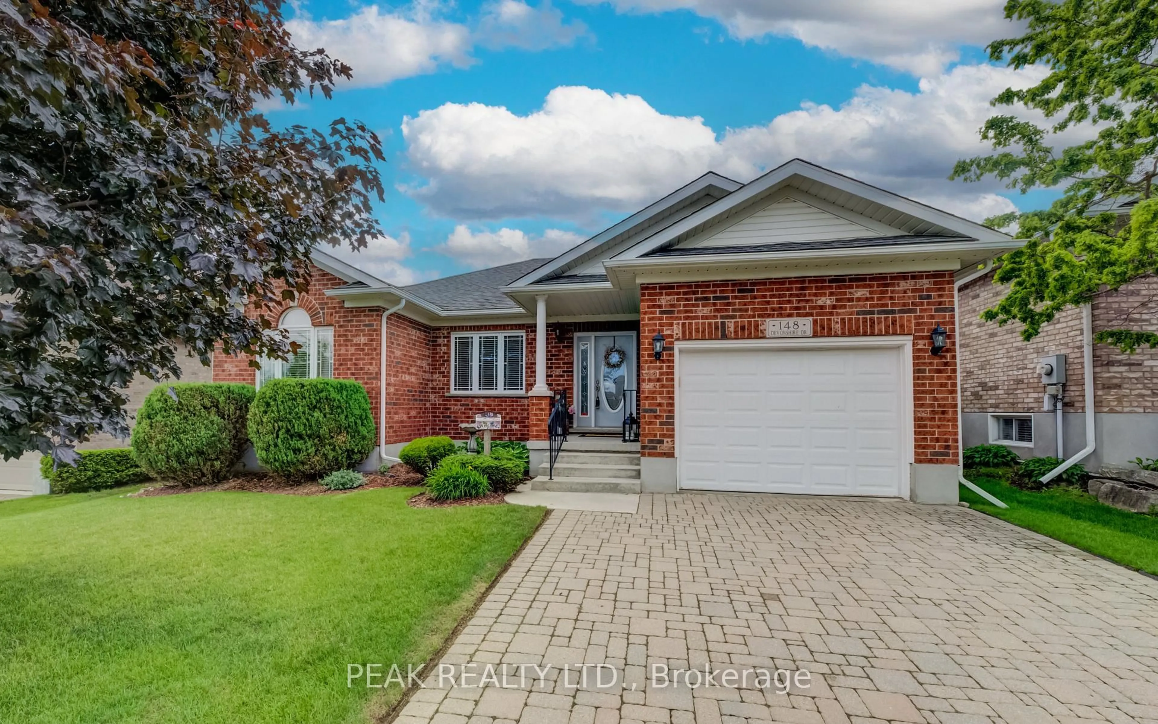 Home with brick exterior material, street for 148 Devonshire Dr, Wilmot Ontario N3A 4J7