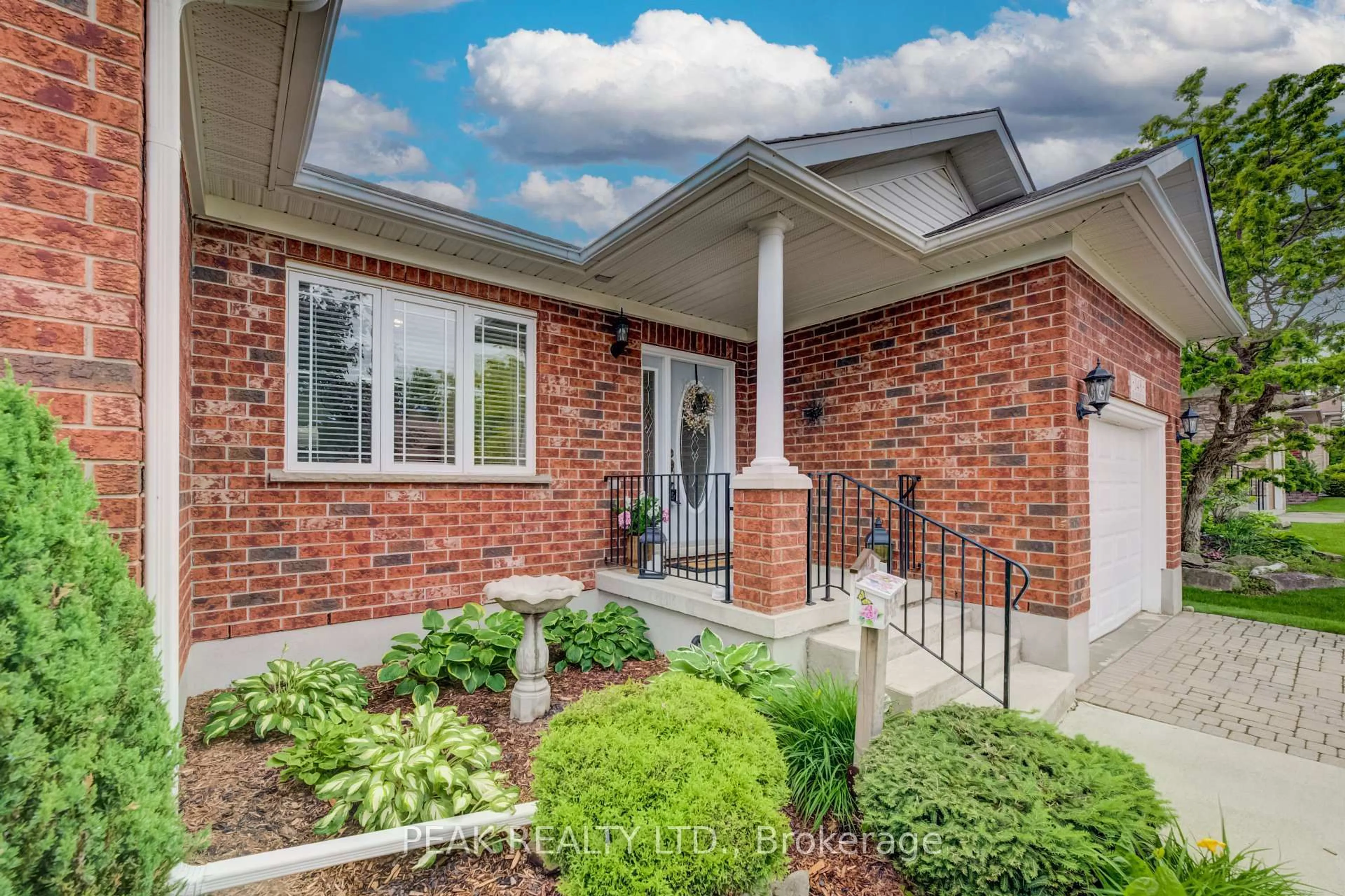 Home with brick exterior material, street for 148 Devonshire Dr, Wilmot Ontario N3A 4J7
