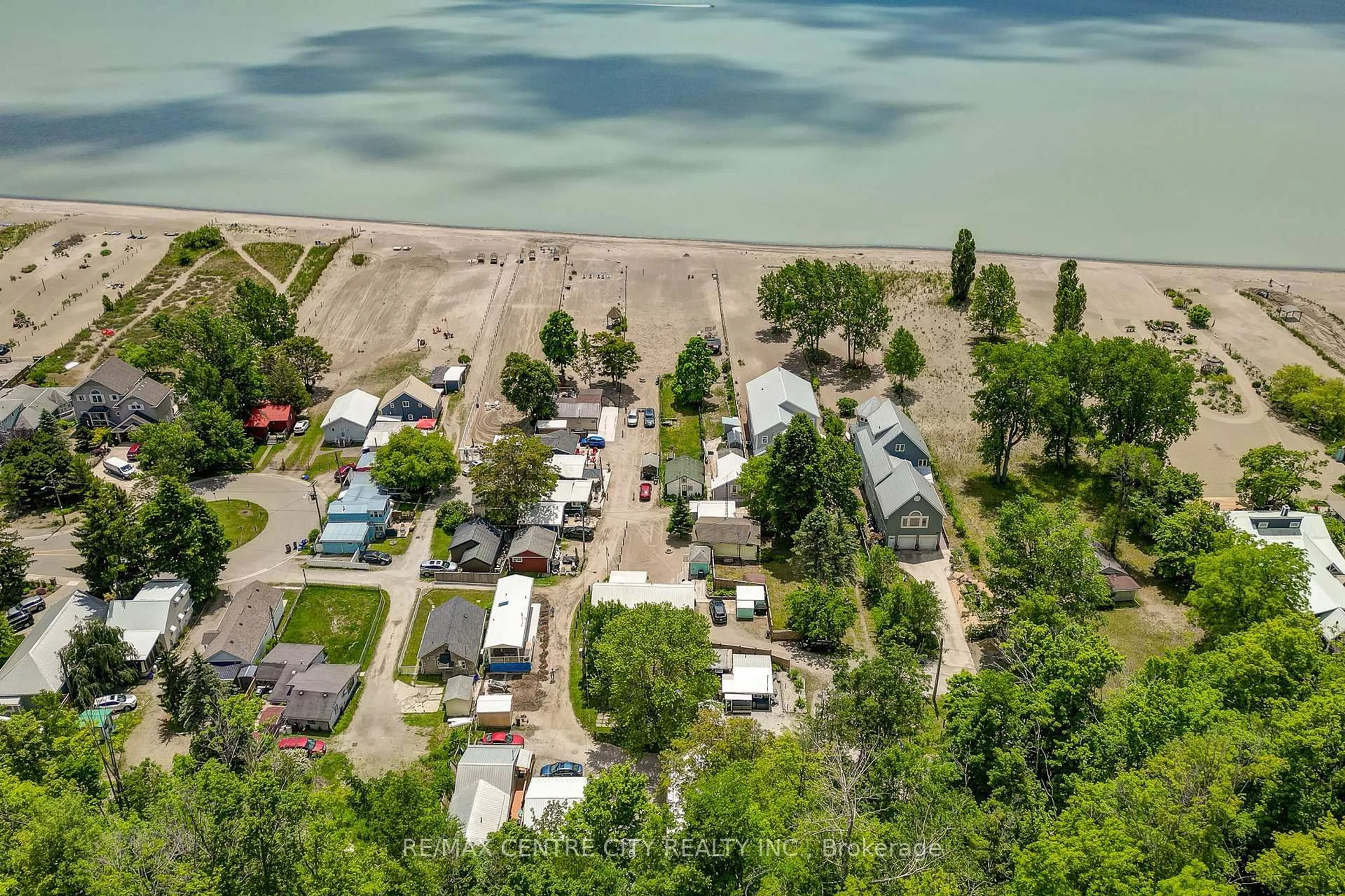 A pic from outside/outdoor area/front of a property/back of a property/a pic from drone, water/lake/river/ocean view for 444D Edith Cavell Blvd #D, Central Elgin Ontario N5L 1G9