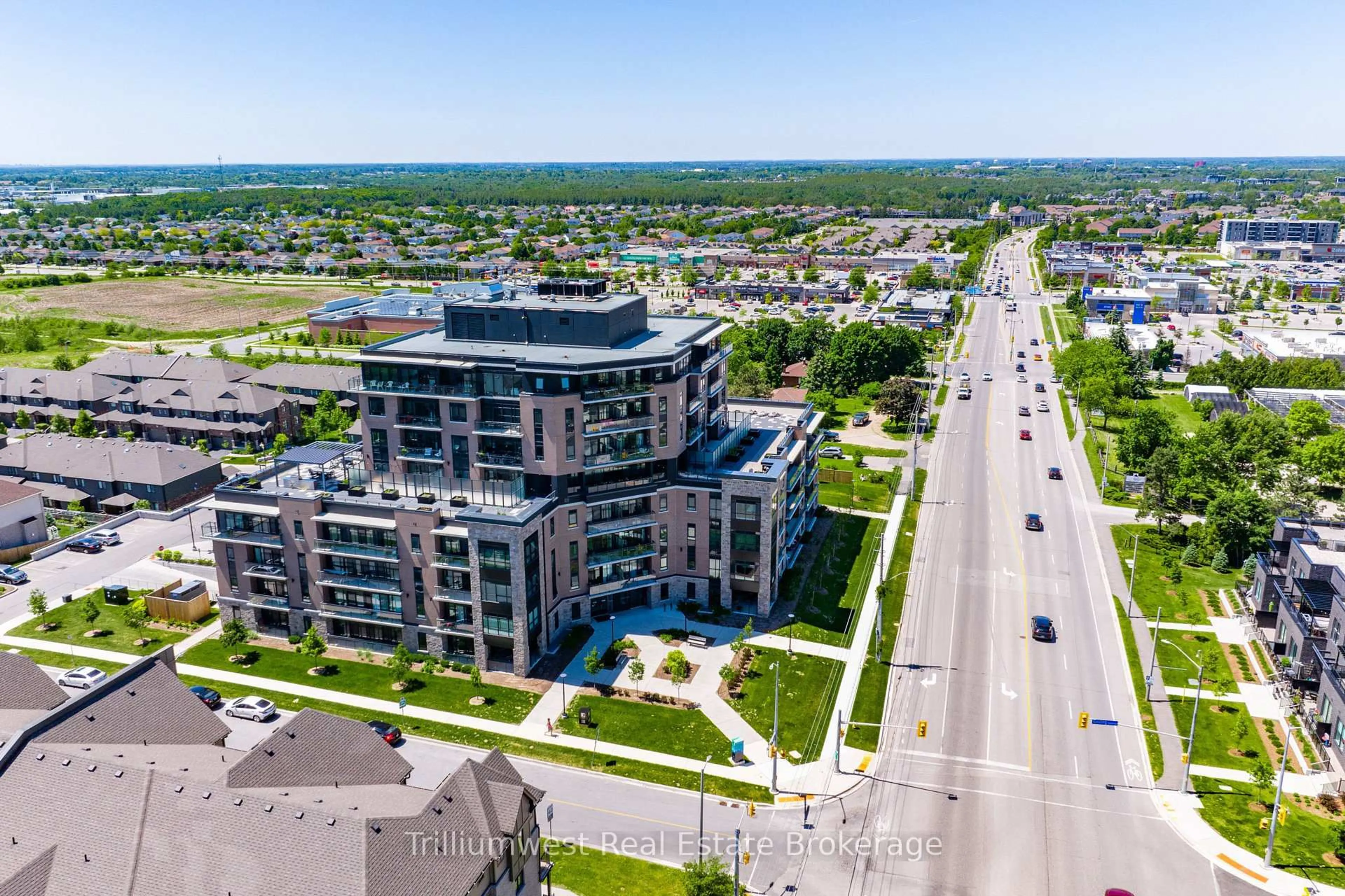 A pic from outside/outdoor area/front of a property/back of a property/a pic from drone, street for 332 Gosling Gdns #202, Guelph Ontario N1L 0P8